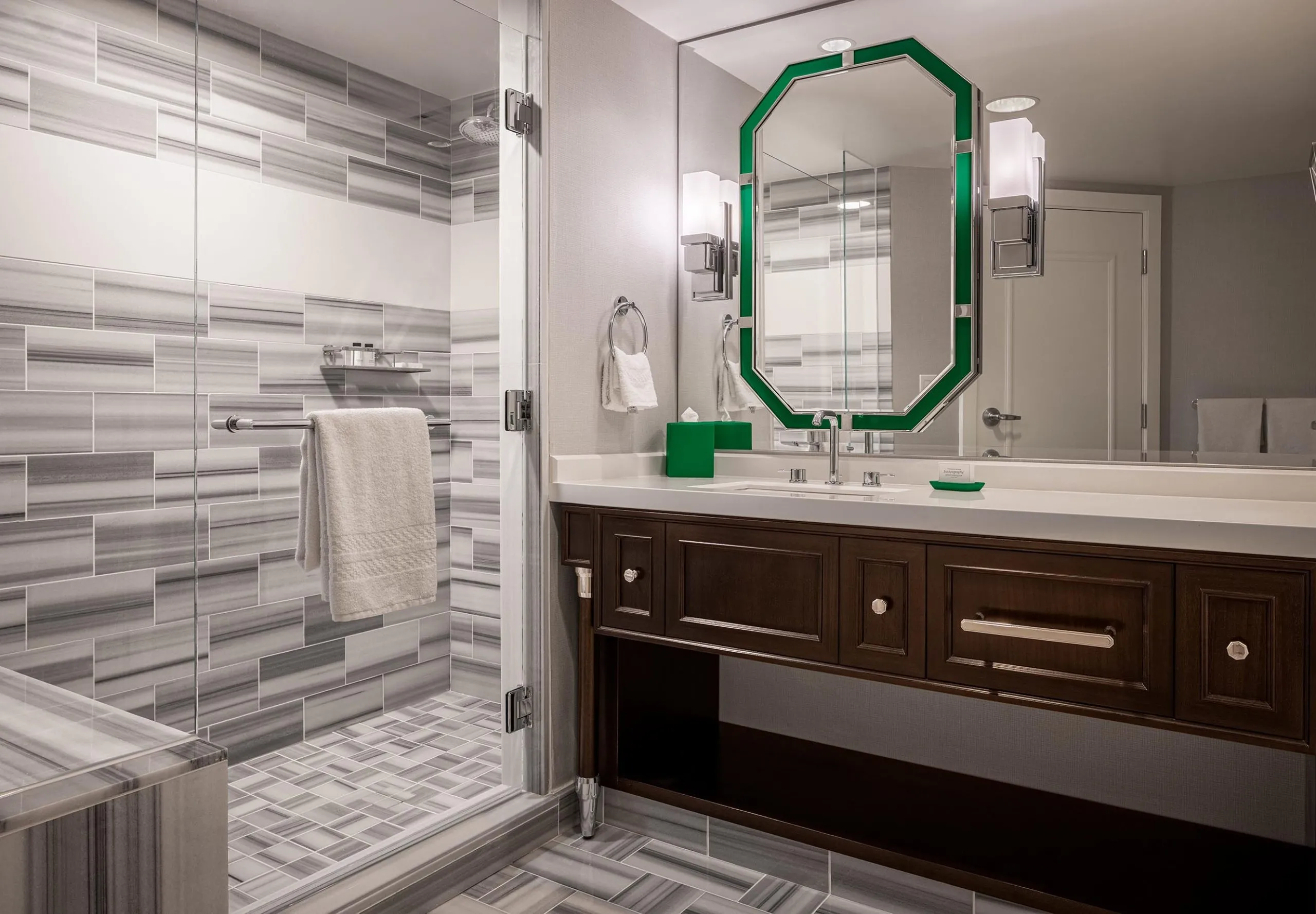 Interior view of hotel bathroom with shower and sink at Caesars Palace