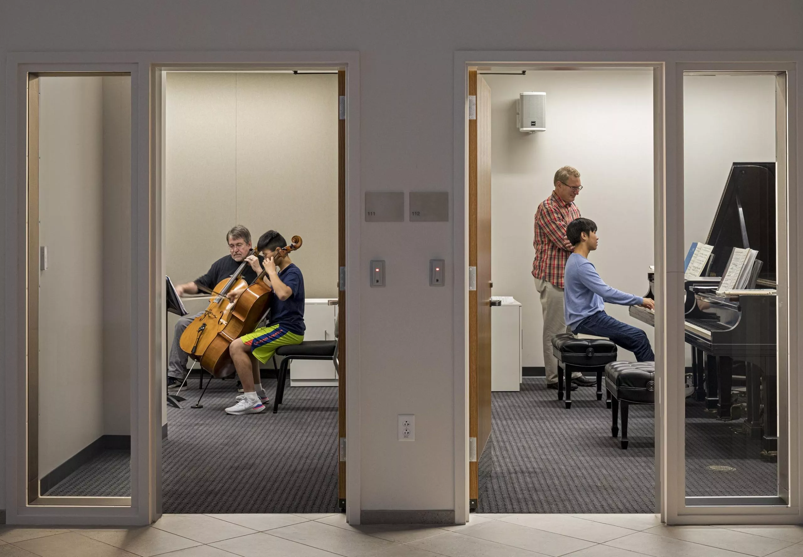 Students practicing instruments in private rooms in George Colony Hall