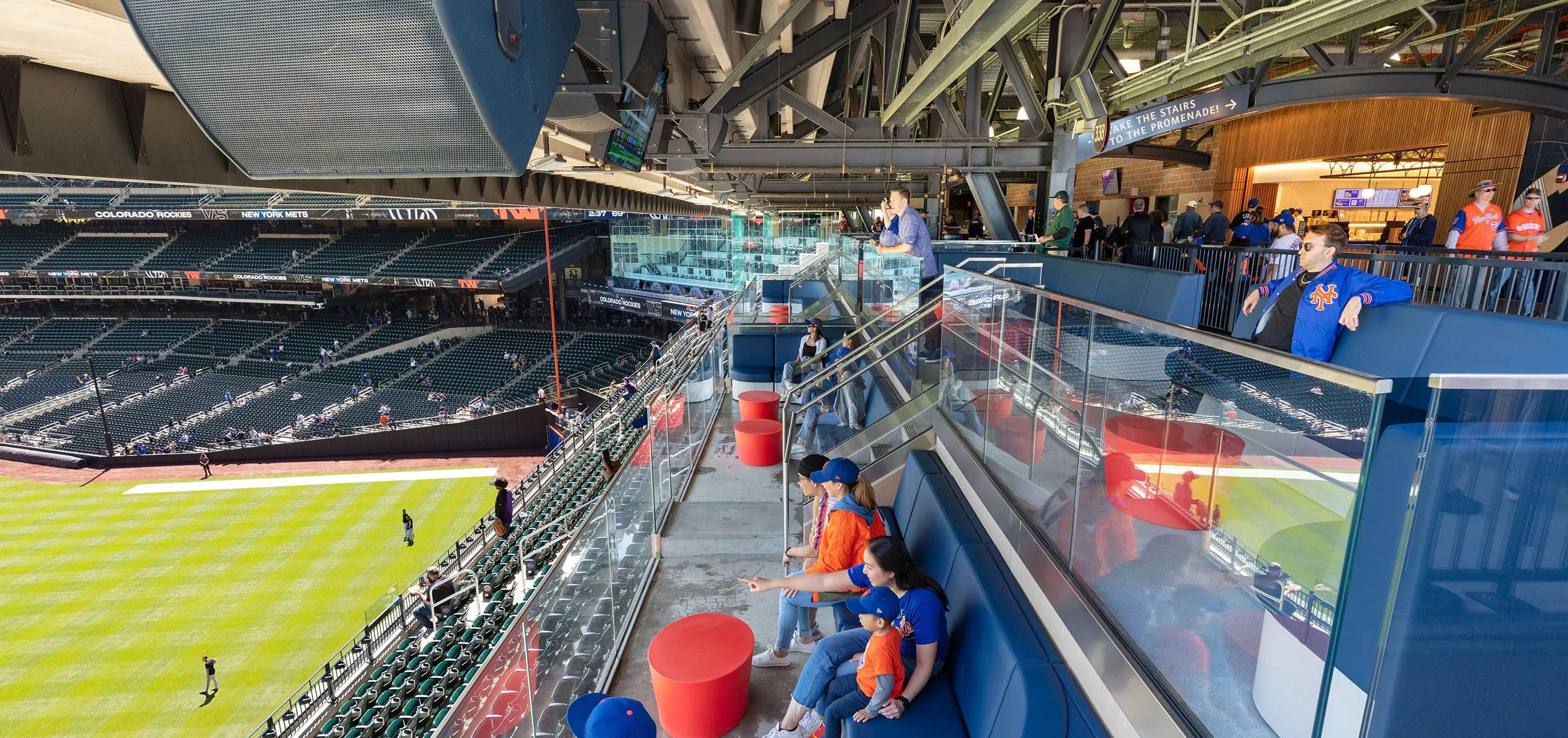 People in couches watching baseball game at Citi Field Stadium