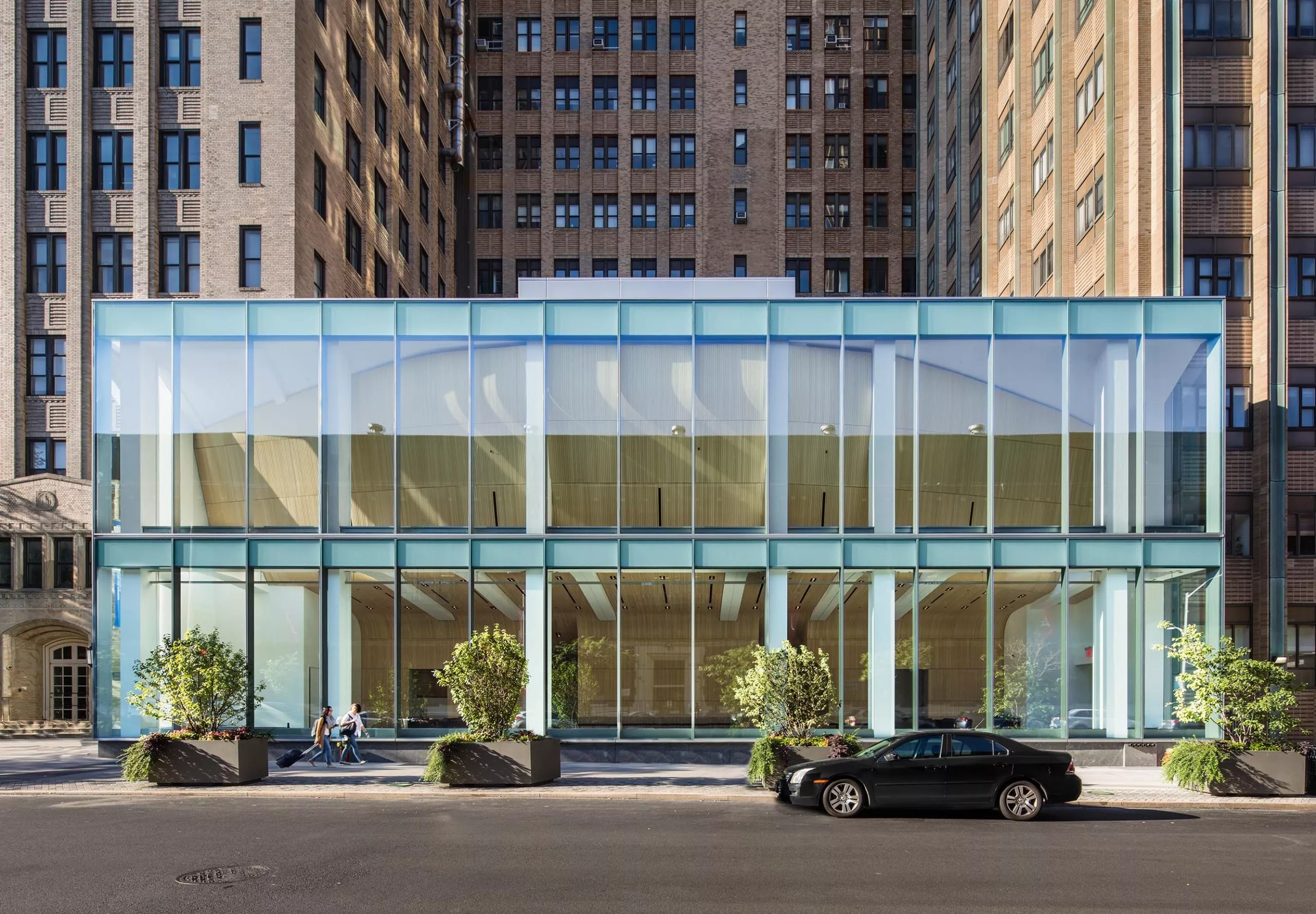 Glass entryway and exterior of Columbia University Alumni Auditorium