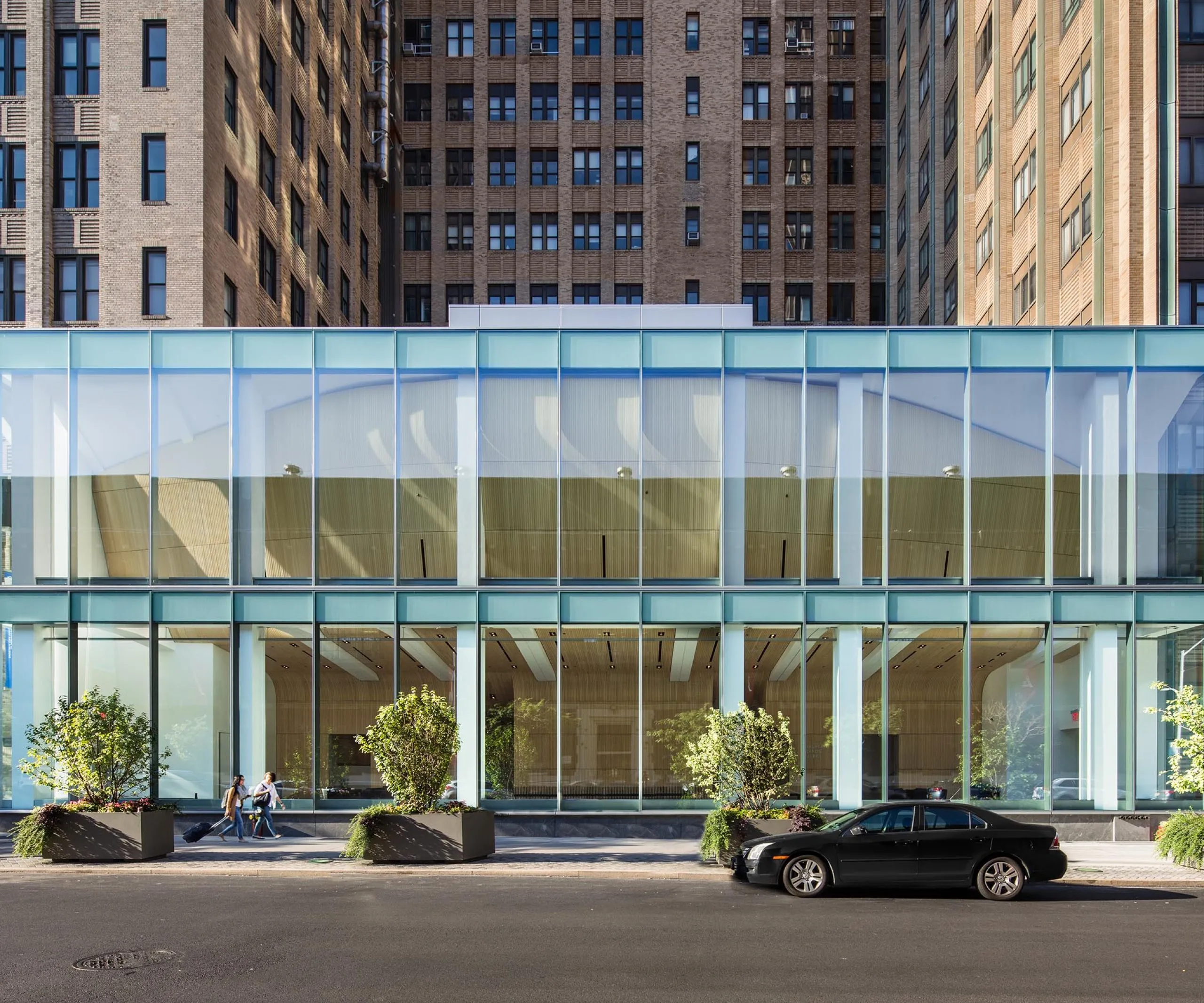 Glass entryway and exterior of Columbia University Alumni Auditorium