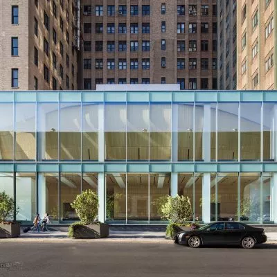 Glass entryway and exterior of Columbia University Alumni Auditorium