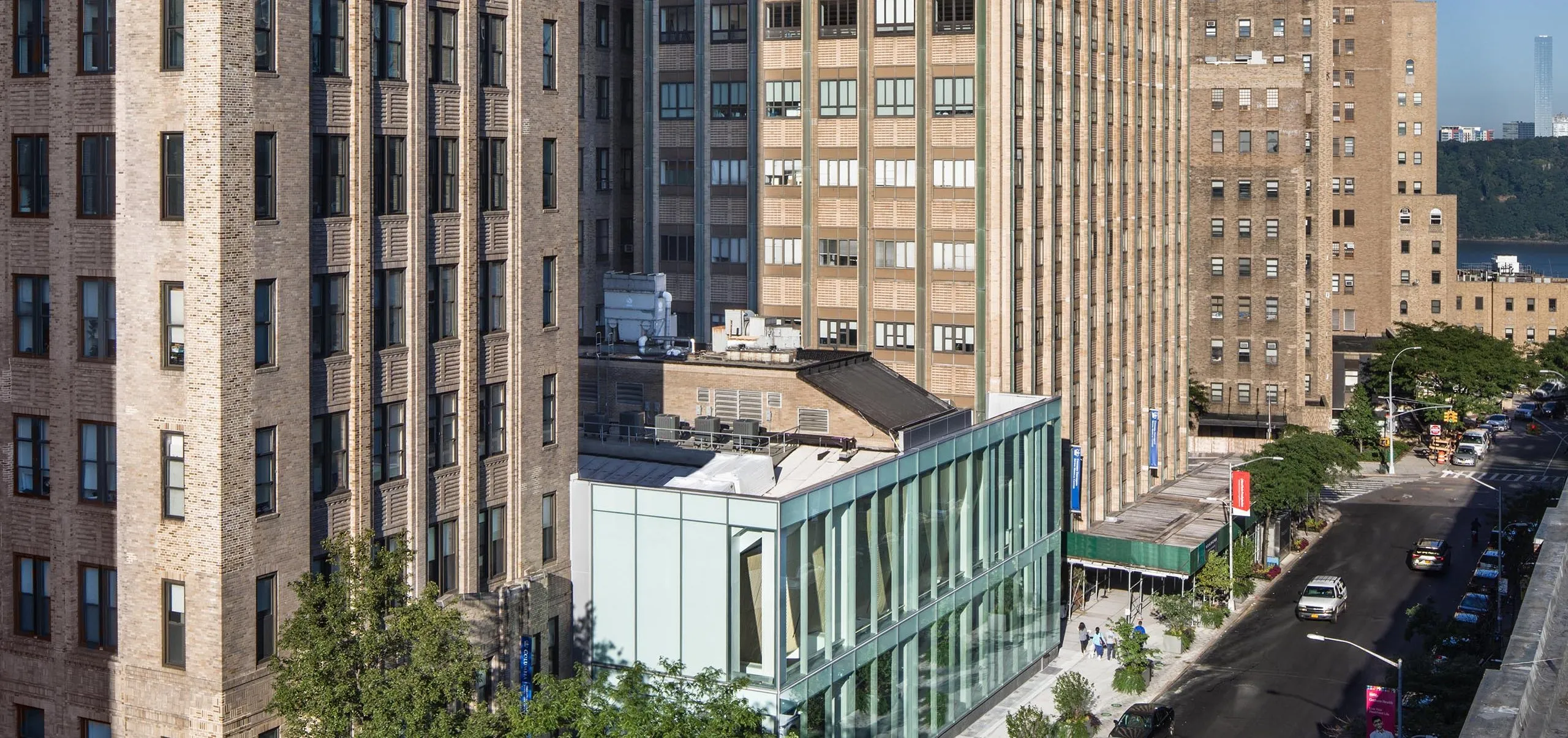 Exterior of Columbia University Alumni Auditorium surrounded by other buildings