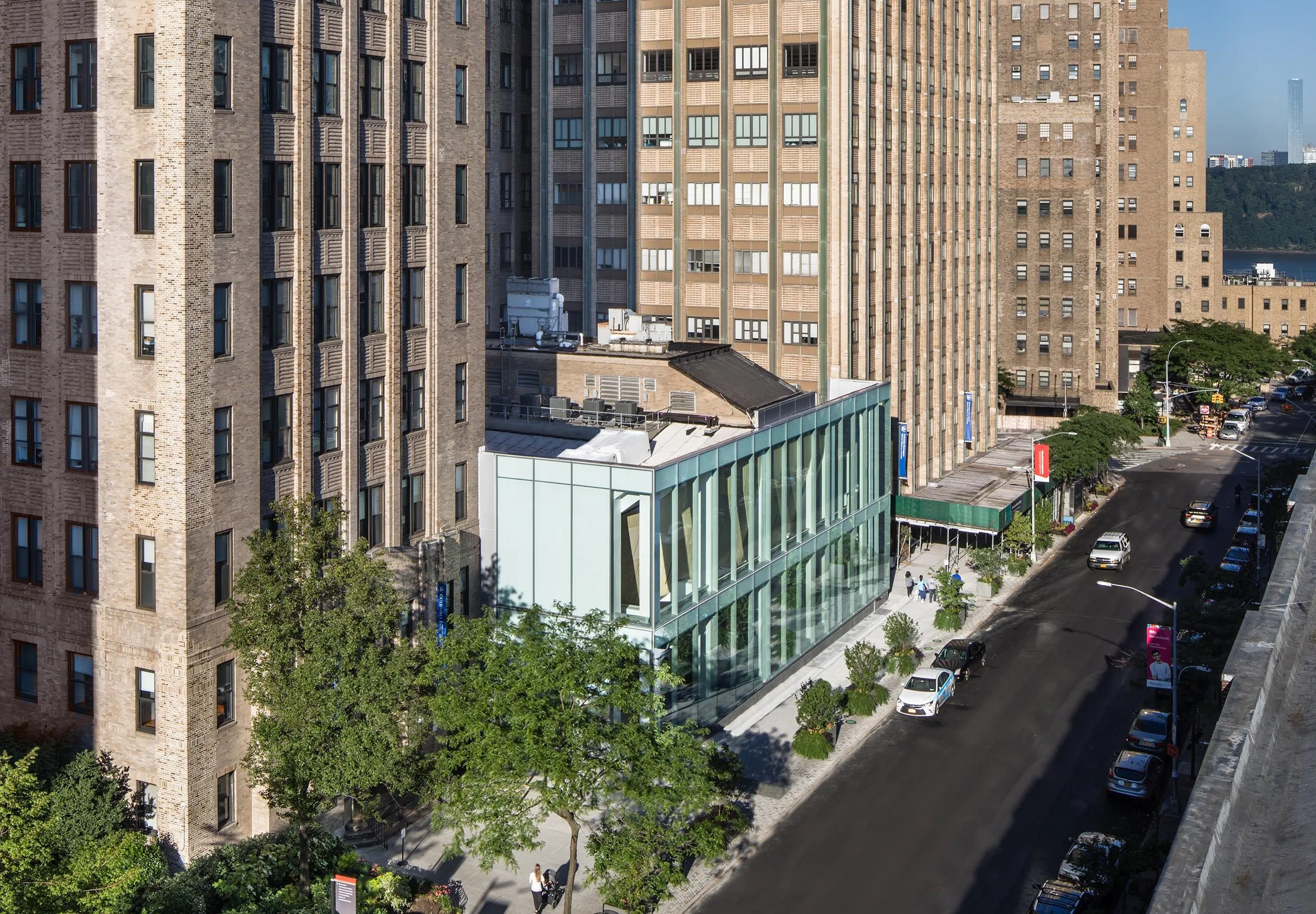 Exterior of Columbia University Alumni Auditorium surrounded by other buildings