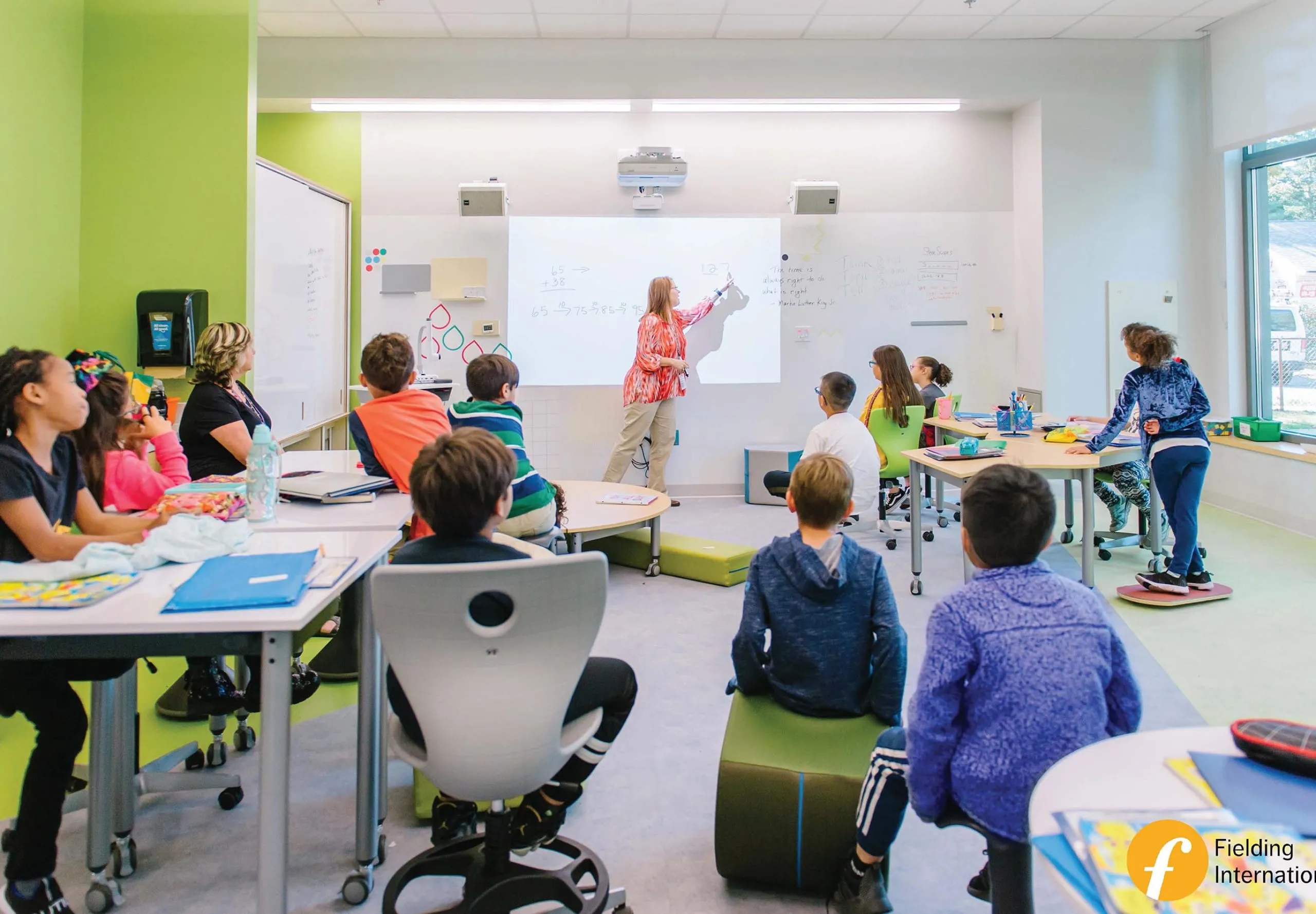 Students looking at white board in classroom at Eden Park Elementary School