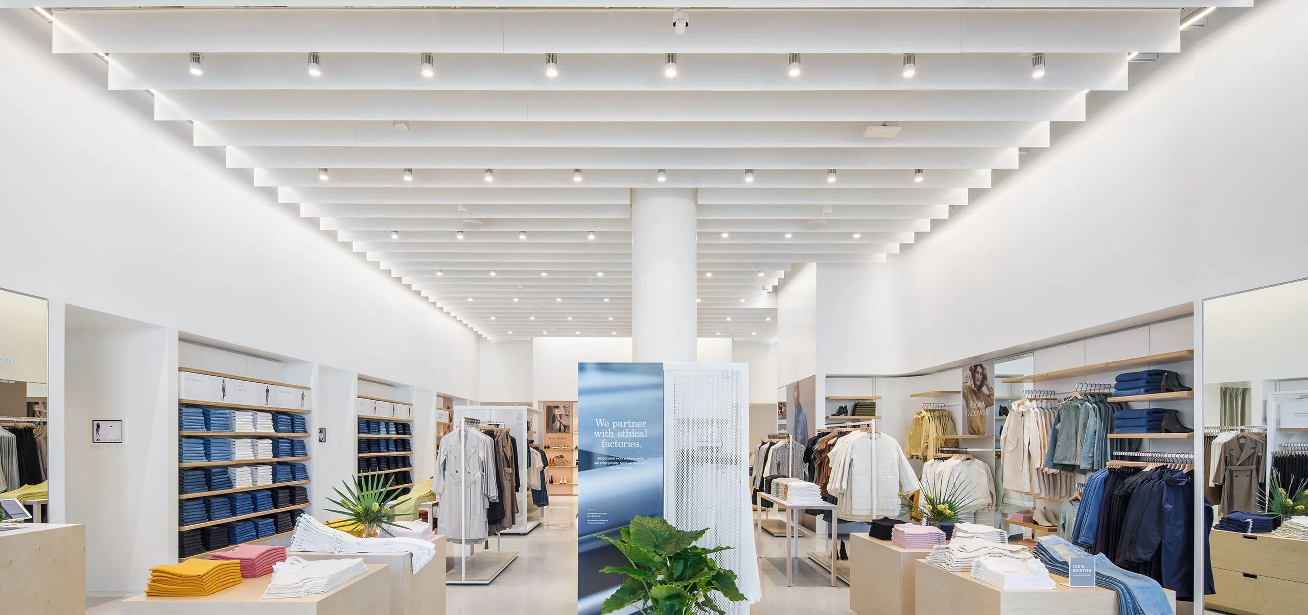 Racks and shelves of close from Everlane