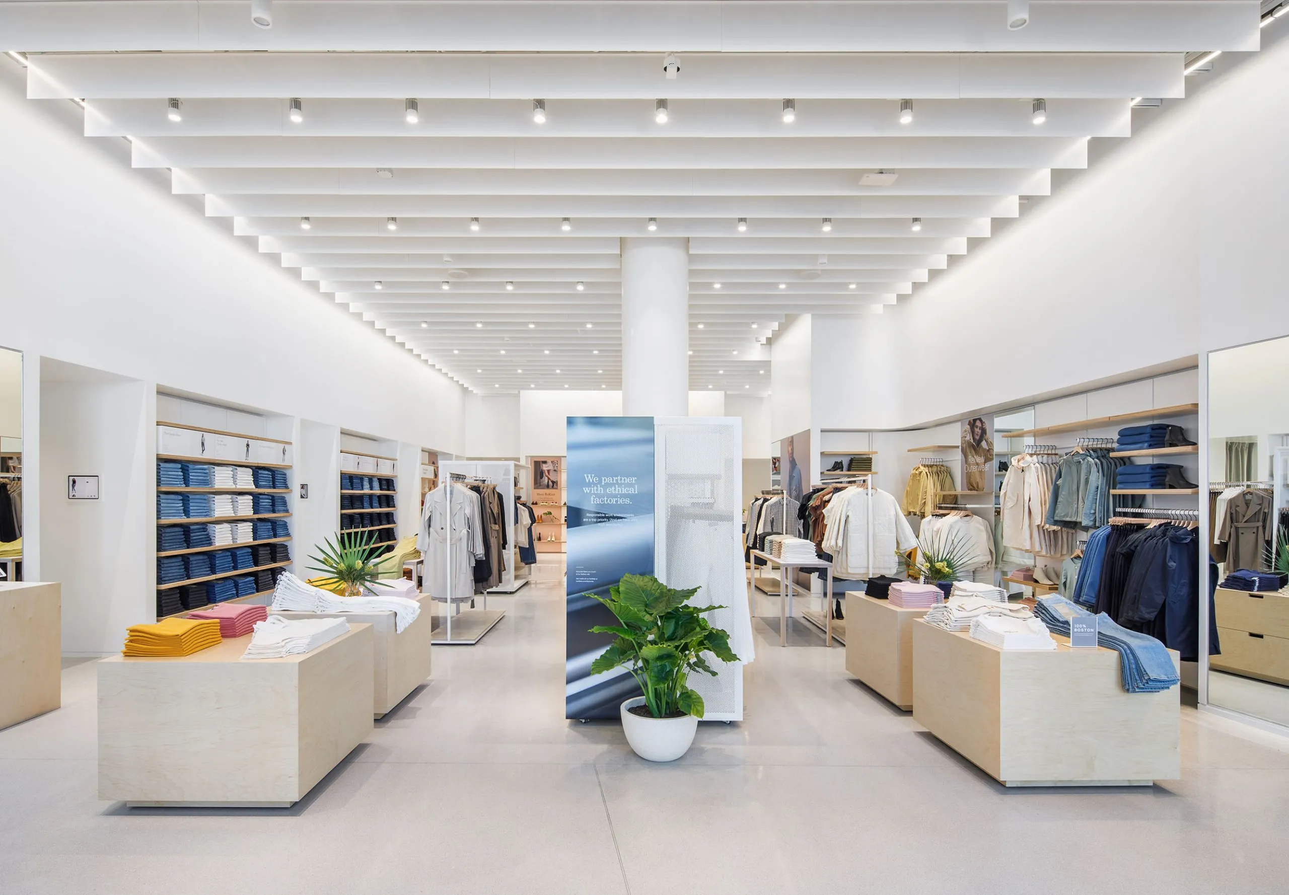 Racks and shelves of close from Everlane