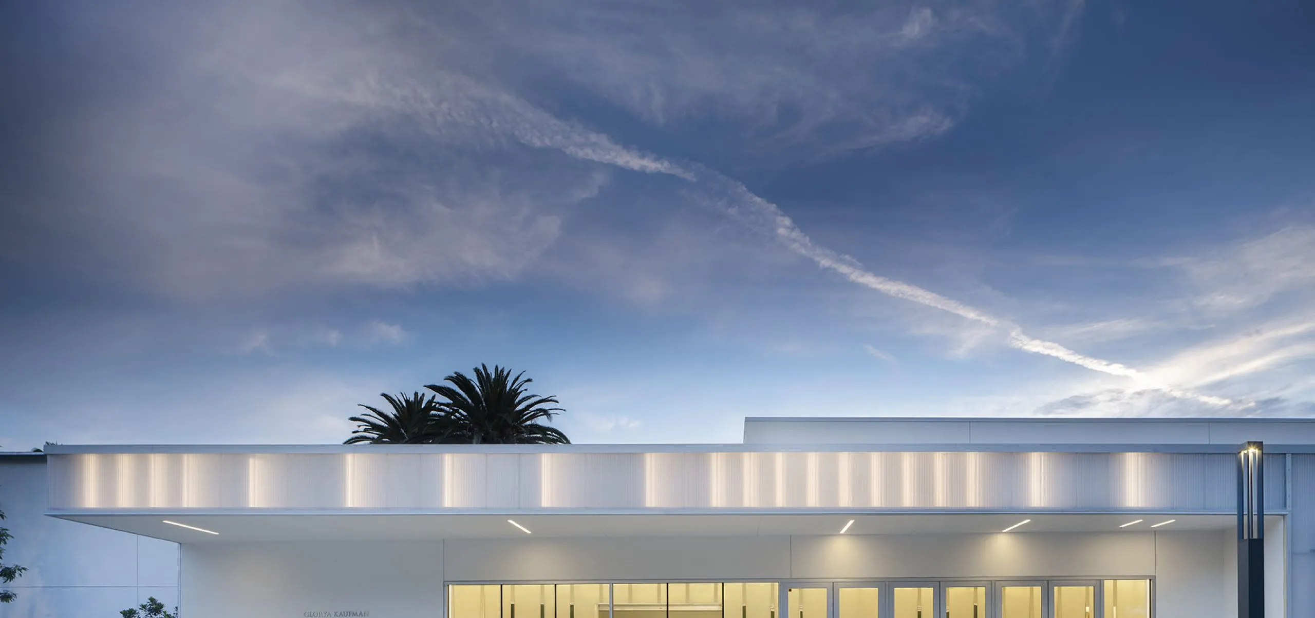 All white exterior of Glorya Kaufman Performing Arts Center