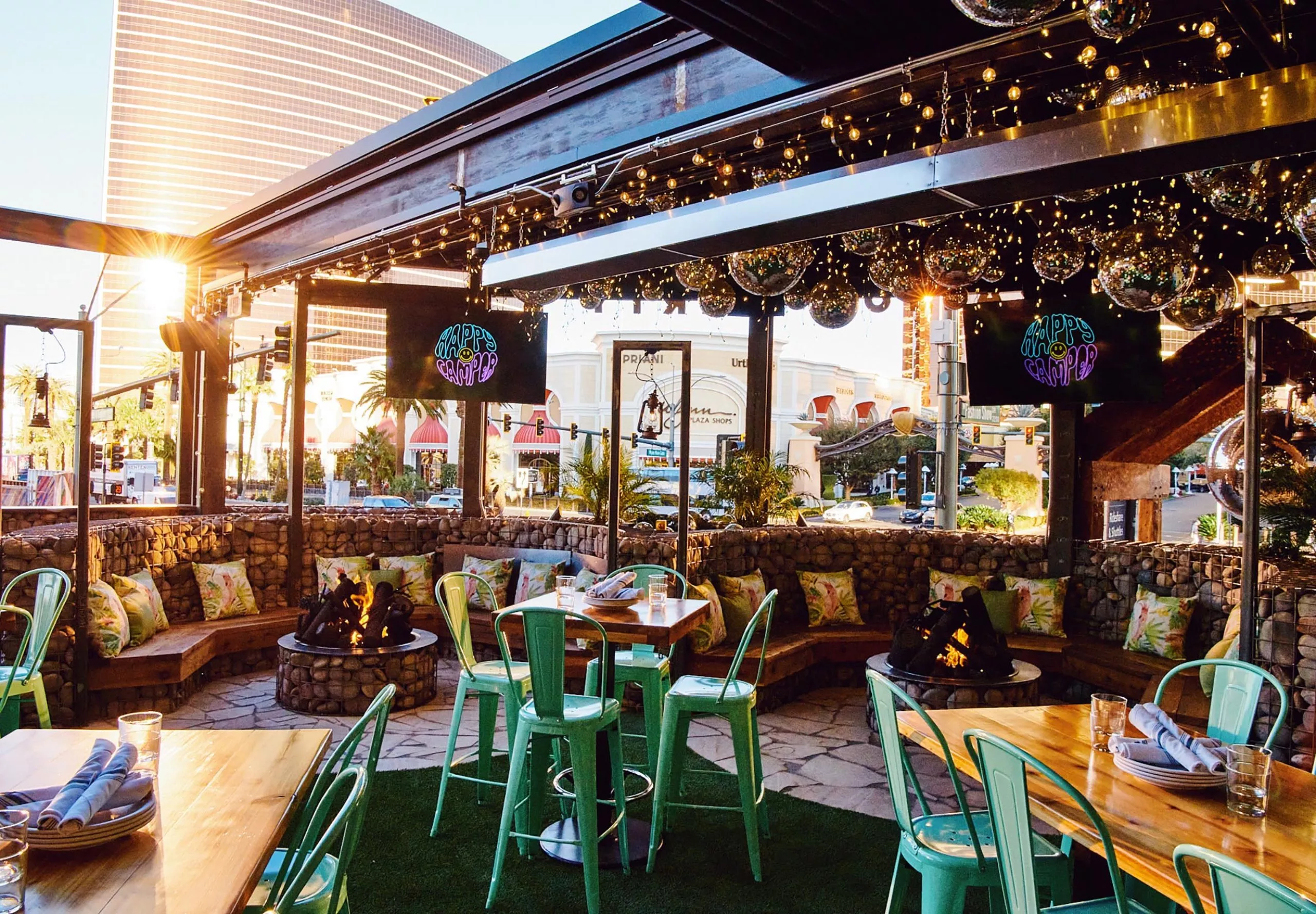 Exterior view of patio seating at Happy Camper