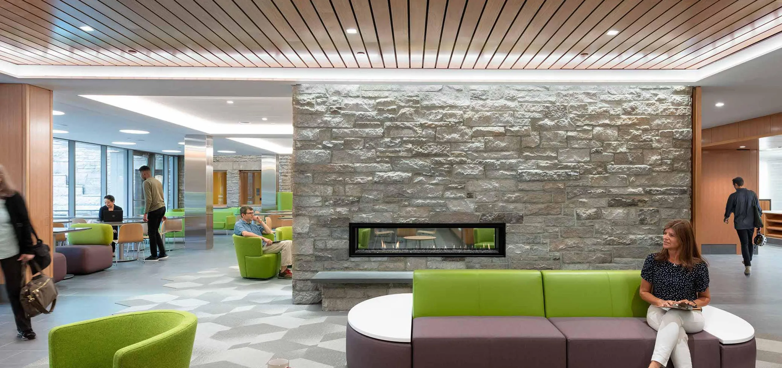 Seating area and fireplace inside Harvard Divinity School – Swartz Hall