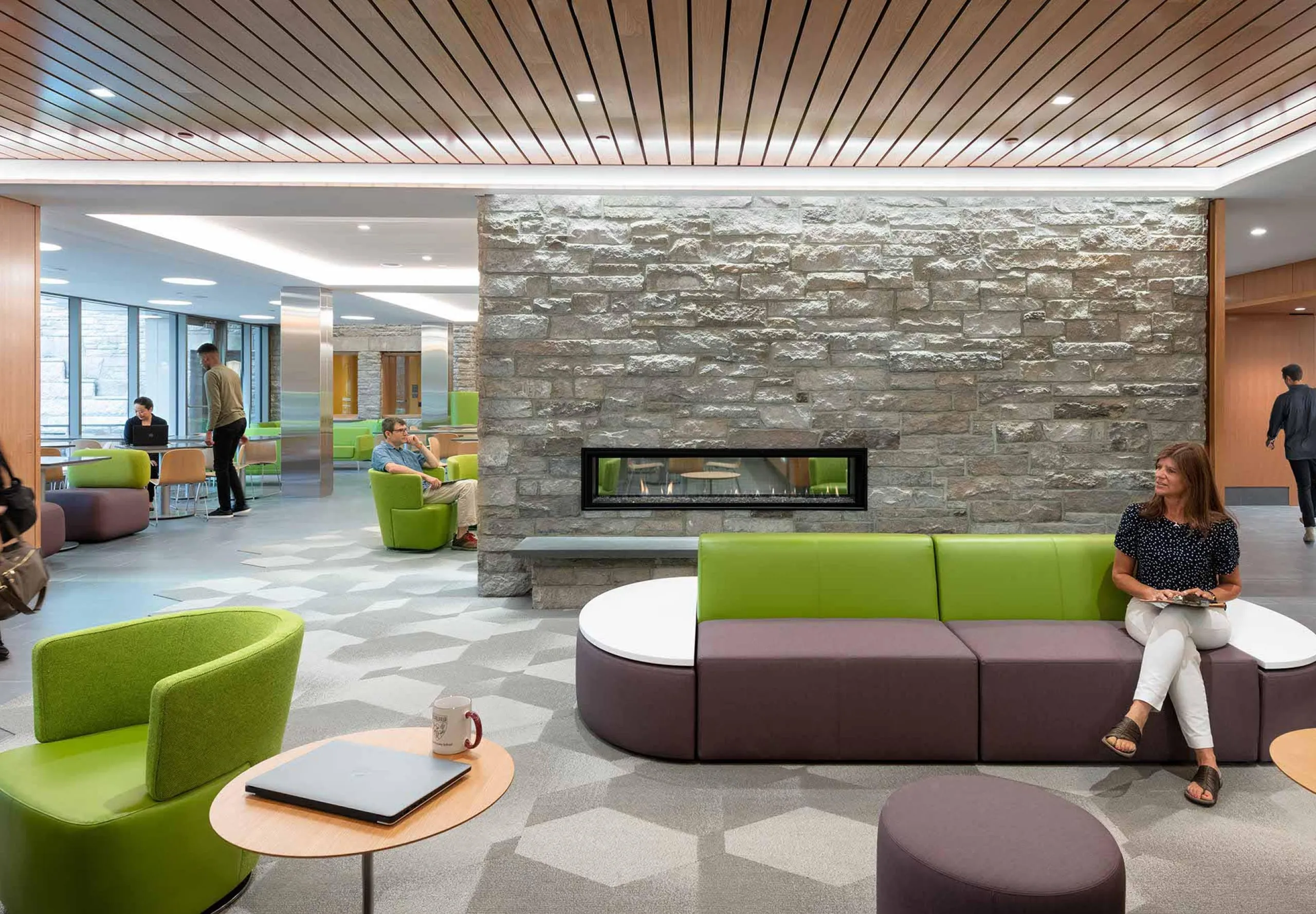 Seating area and fireplace inside Harvard Divinity School – Swartz Hall