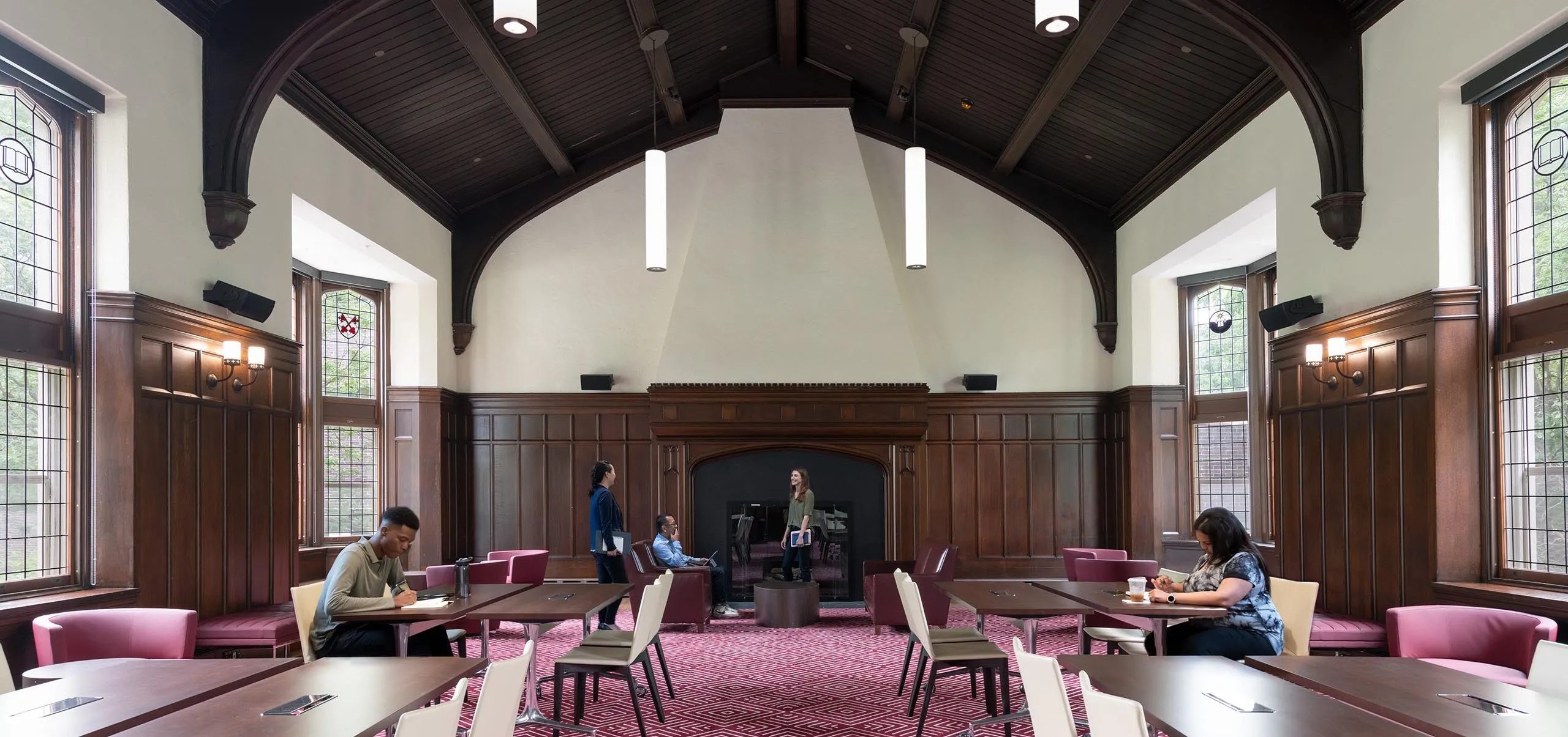 Room with tables and chairs in Harvard Divinity School – Swartz Hall