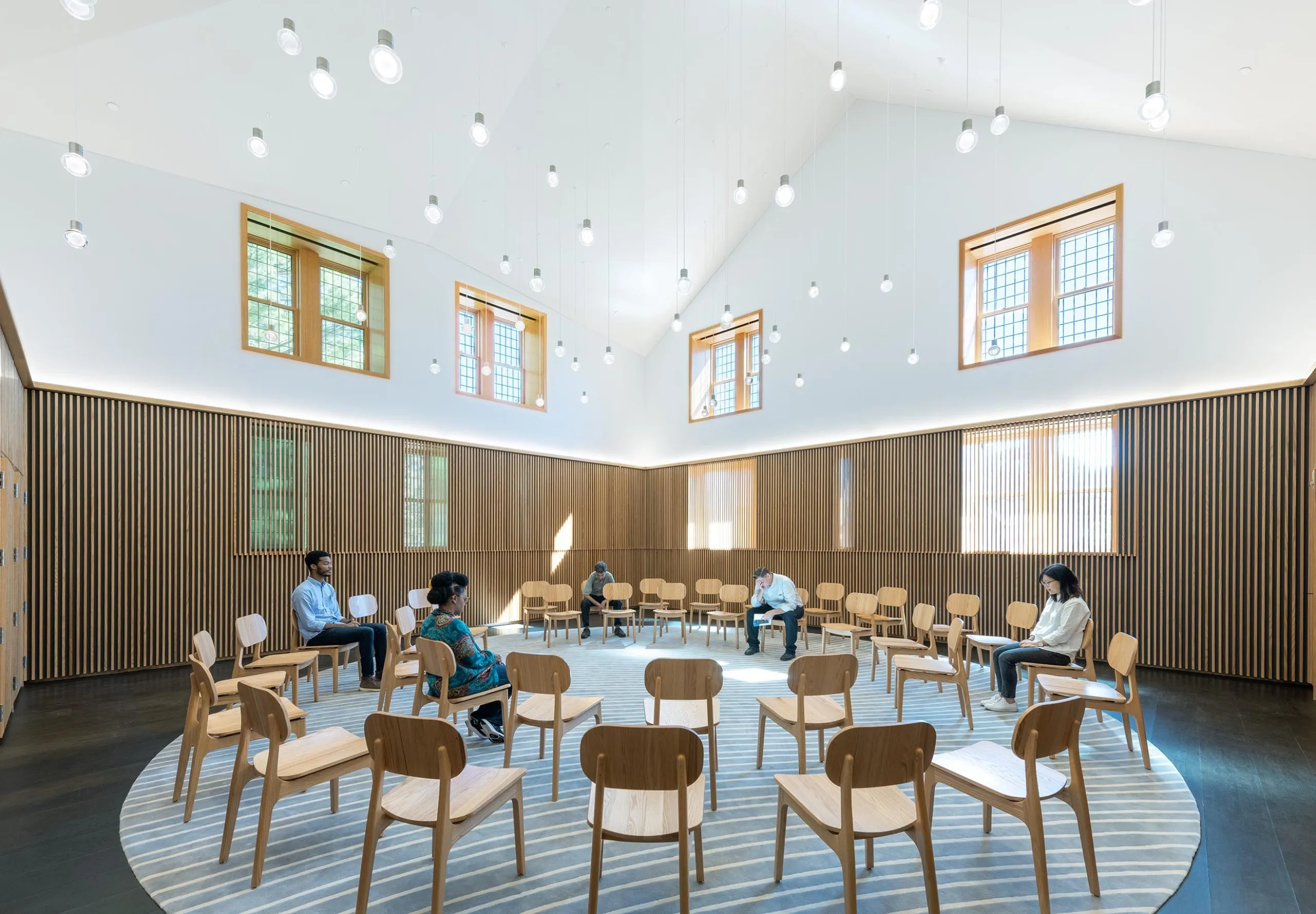 Chairs organized in a circle in Harvard Divinity School – Swartz Hall