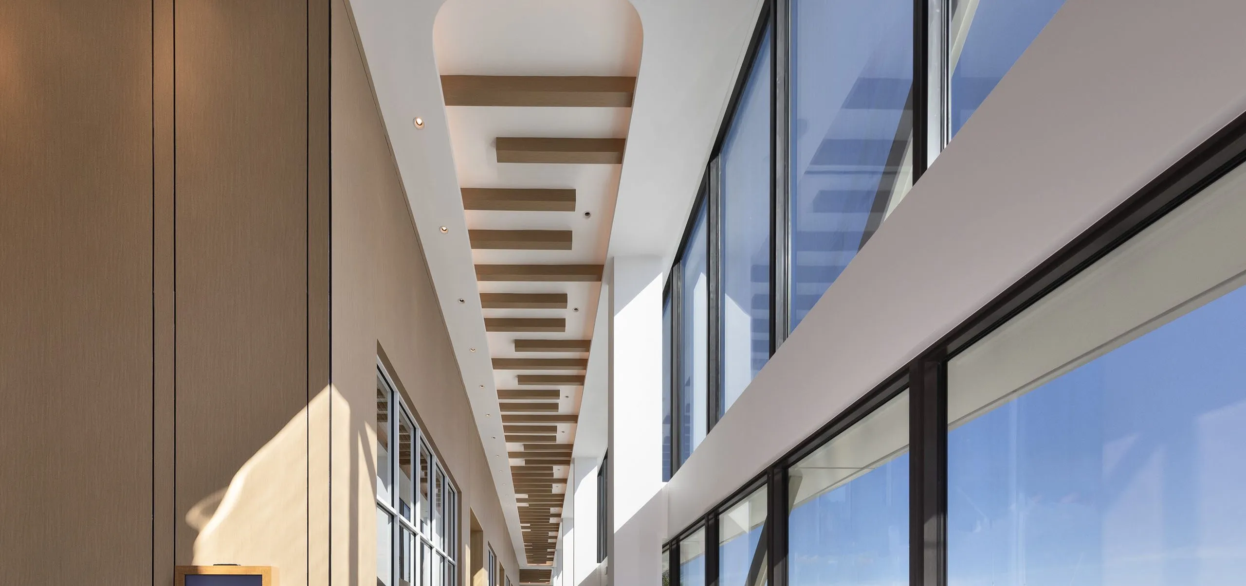 Interior view of a hallway and windows at the Hilton Fort Lauderdale Marina Event Center