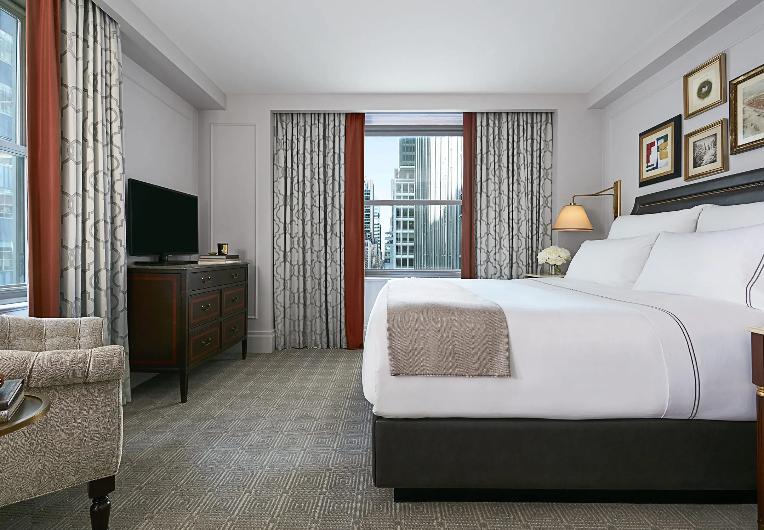 Interior view of a hotel room with a bed at InterContinental New York Barclay