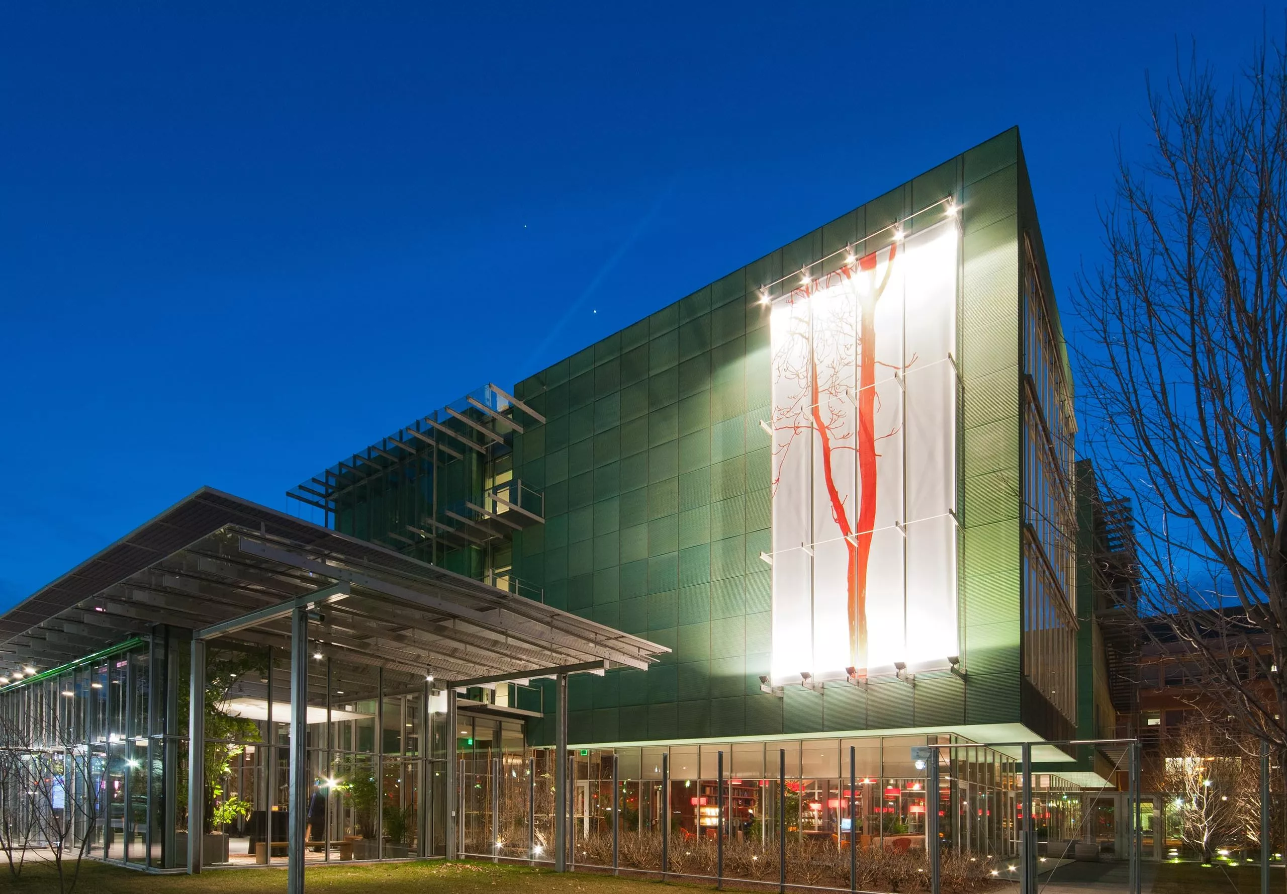 Exterior of Isabella Stewart Gardner Museum with large artwork on the walls