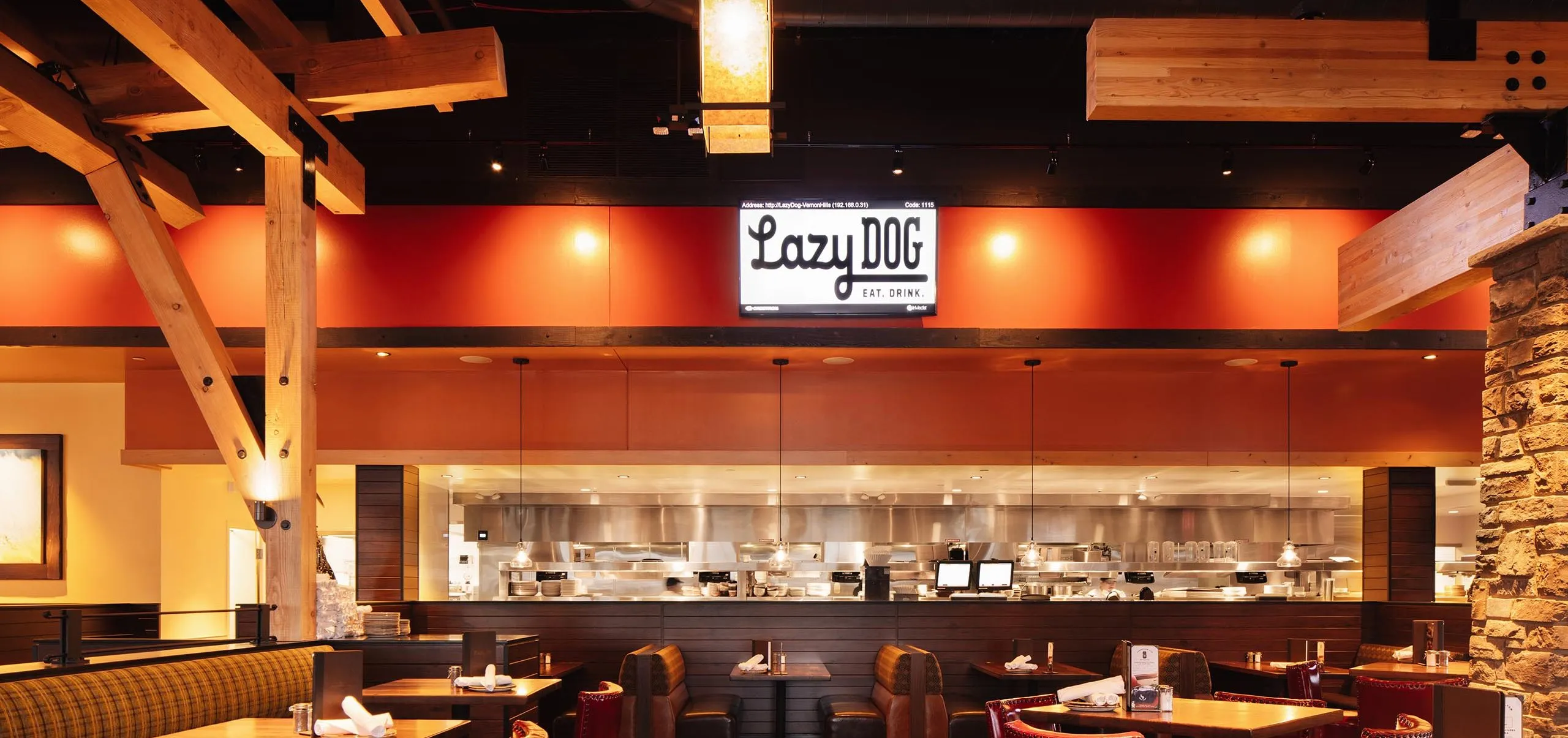 Interior view of Lazy Dog restaurant dining room and kitchen