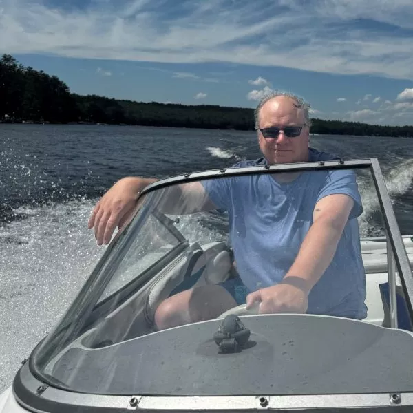 Mark Malmquist on a boat