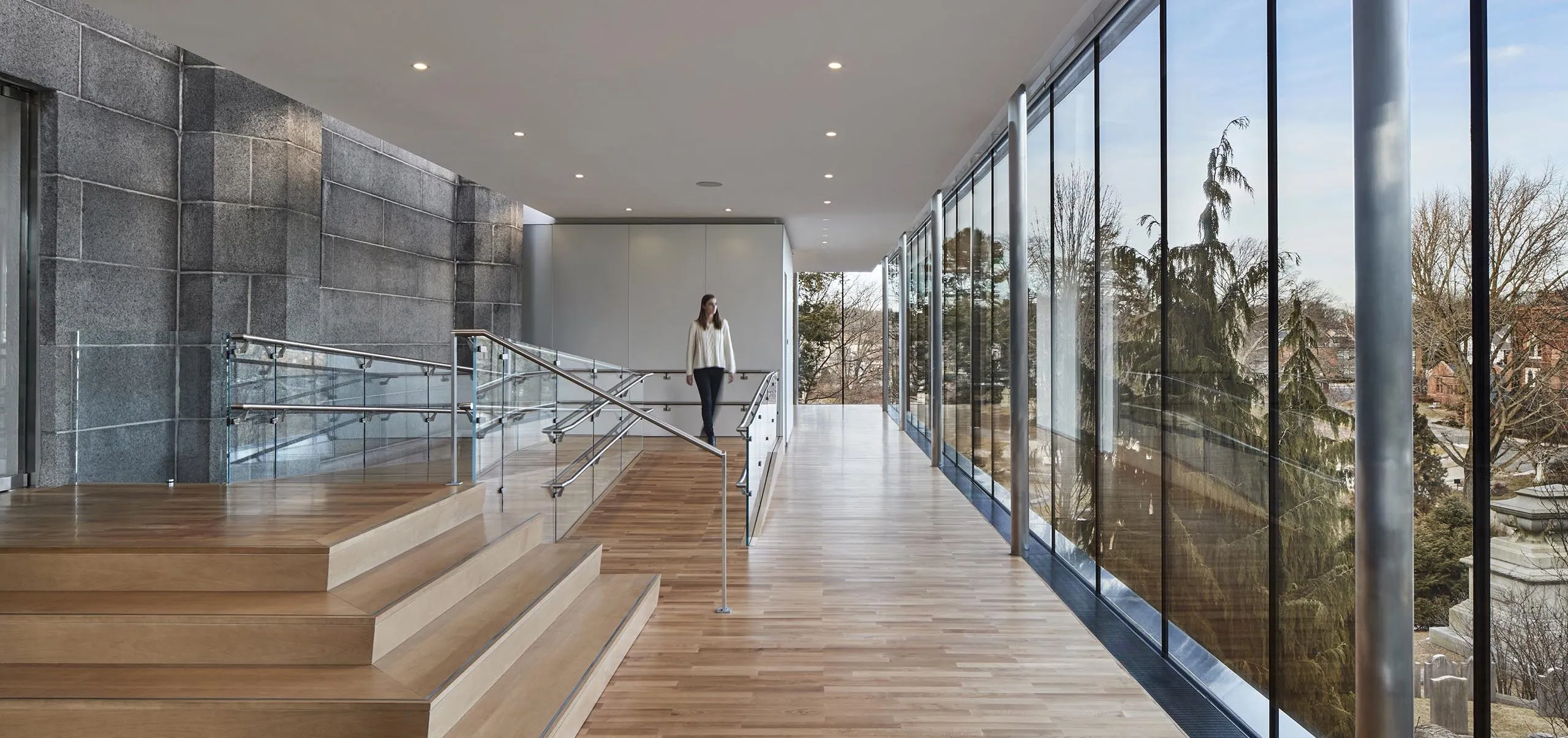 Interior modern viewing area with large glass windows at Bigelow Chapel