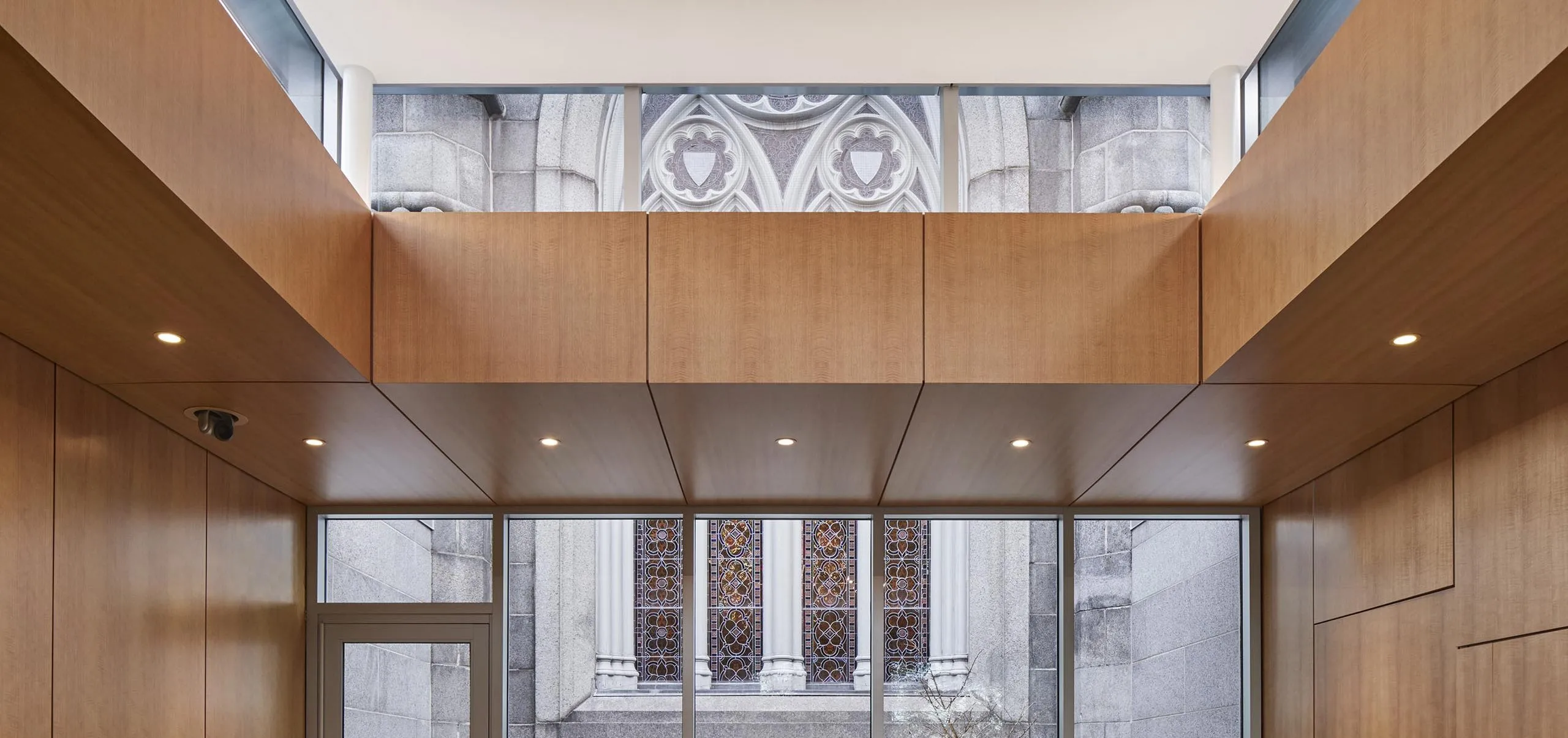 Room with wooden walls at Bigelow Chapel