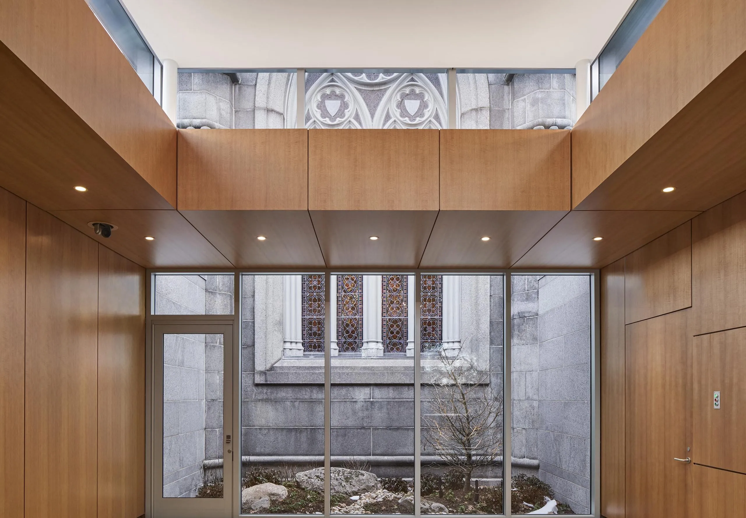 Room with wooden walls at Bigelow Chapel