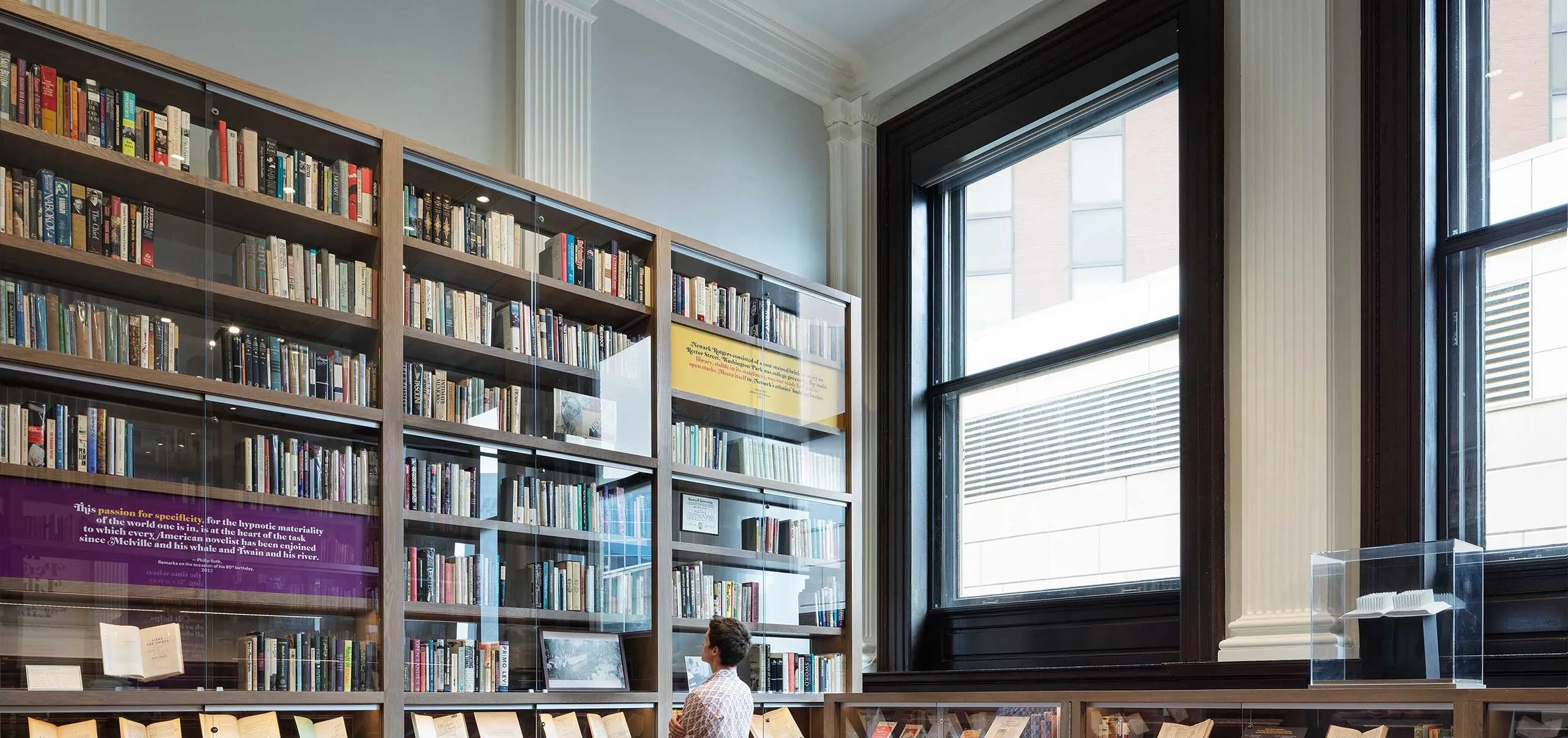 Large bookshelves and display cases at the Phillip Roth Personal Library