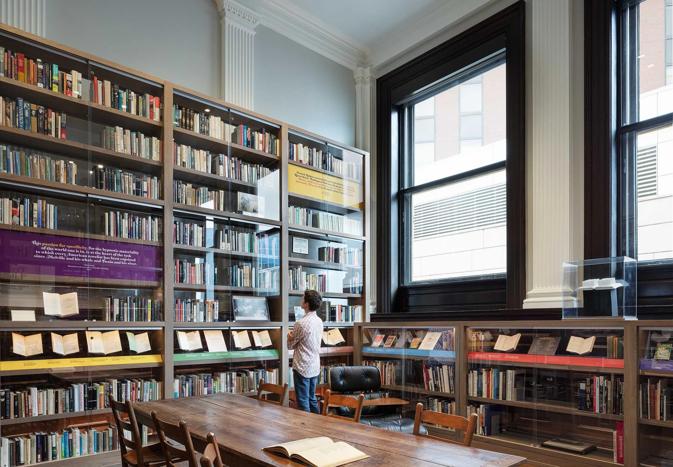 Large bookshelves and display cases at the Phillip Roth Personal Library