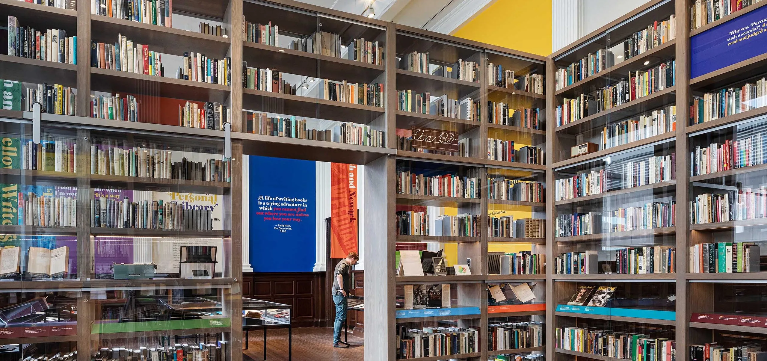 Large bookshelves and display cases at the Phillip Roth Personal Library