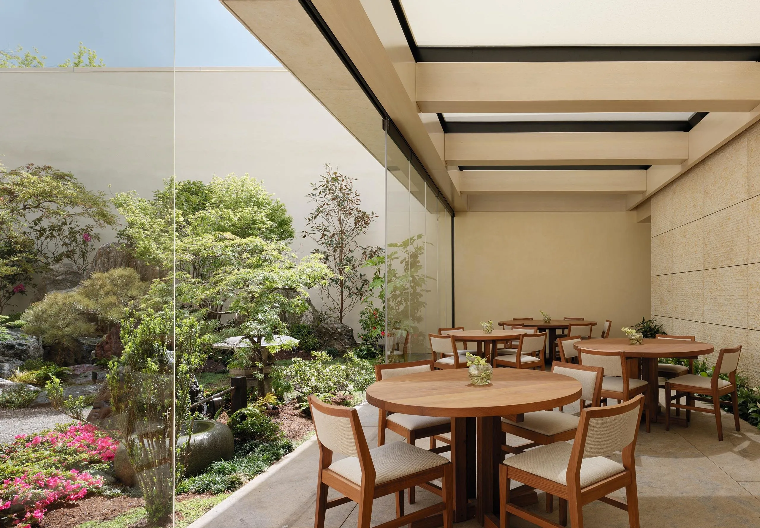 Interior view of Nobu Palo Alto Garden Restaurant dining tables and garden