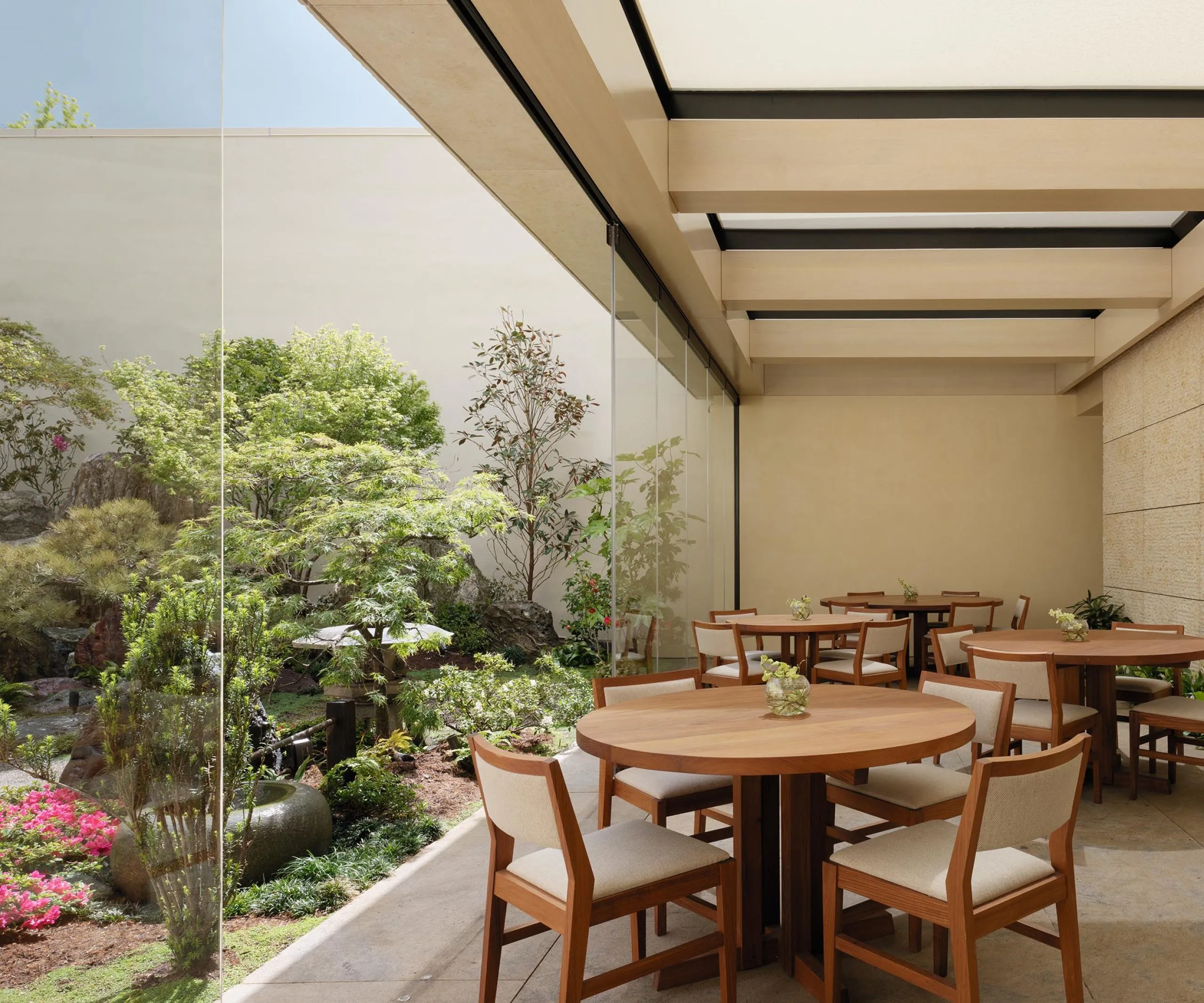 Interior view of Nobu Palo Alto Garden Restaurant dining tables and garden