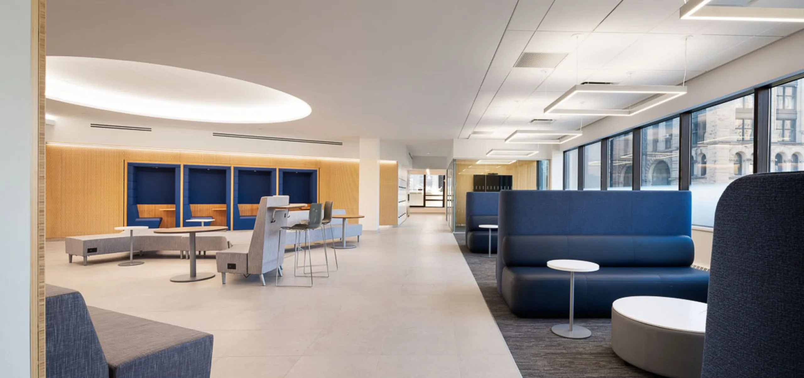 Sitting area and booths inside One Pace Plaza West