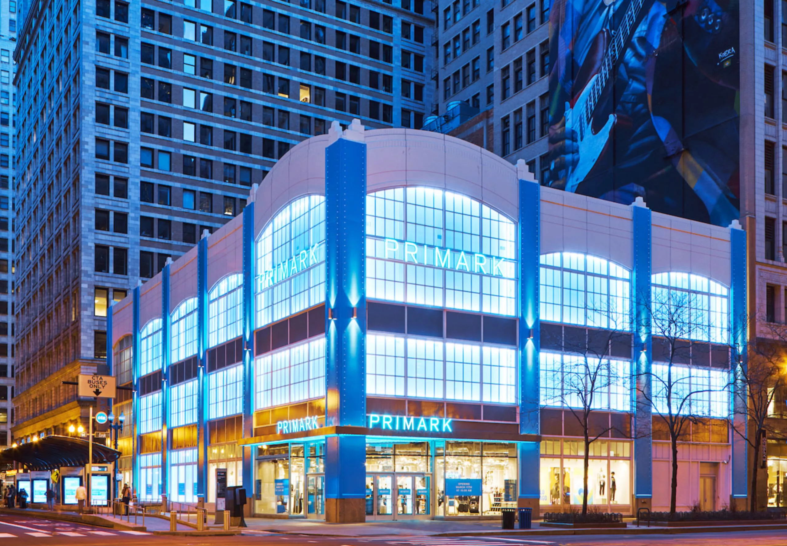 Brightly lit exterior of Primark building