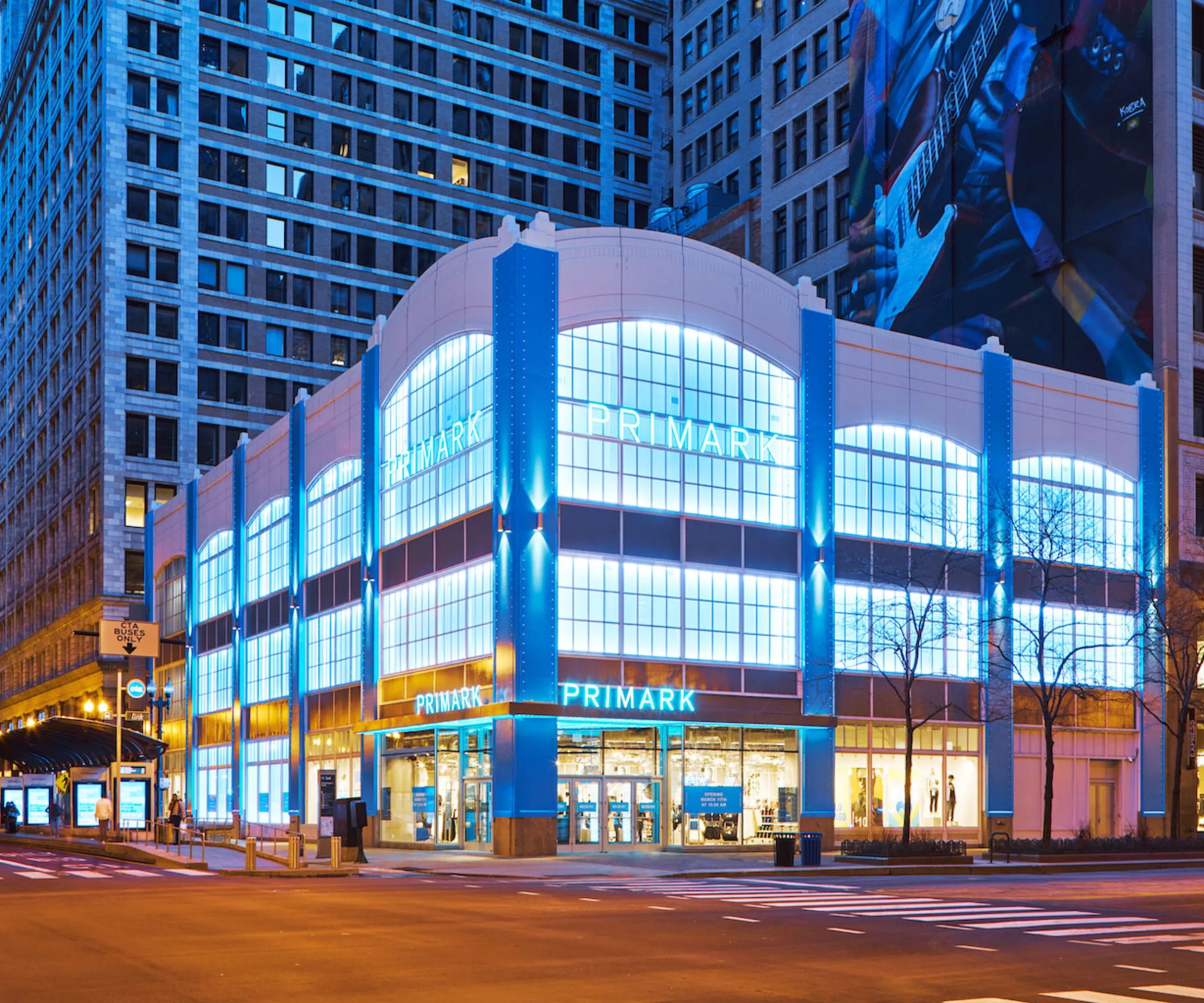 Brightly lit exterior of Primark building