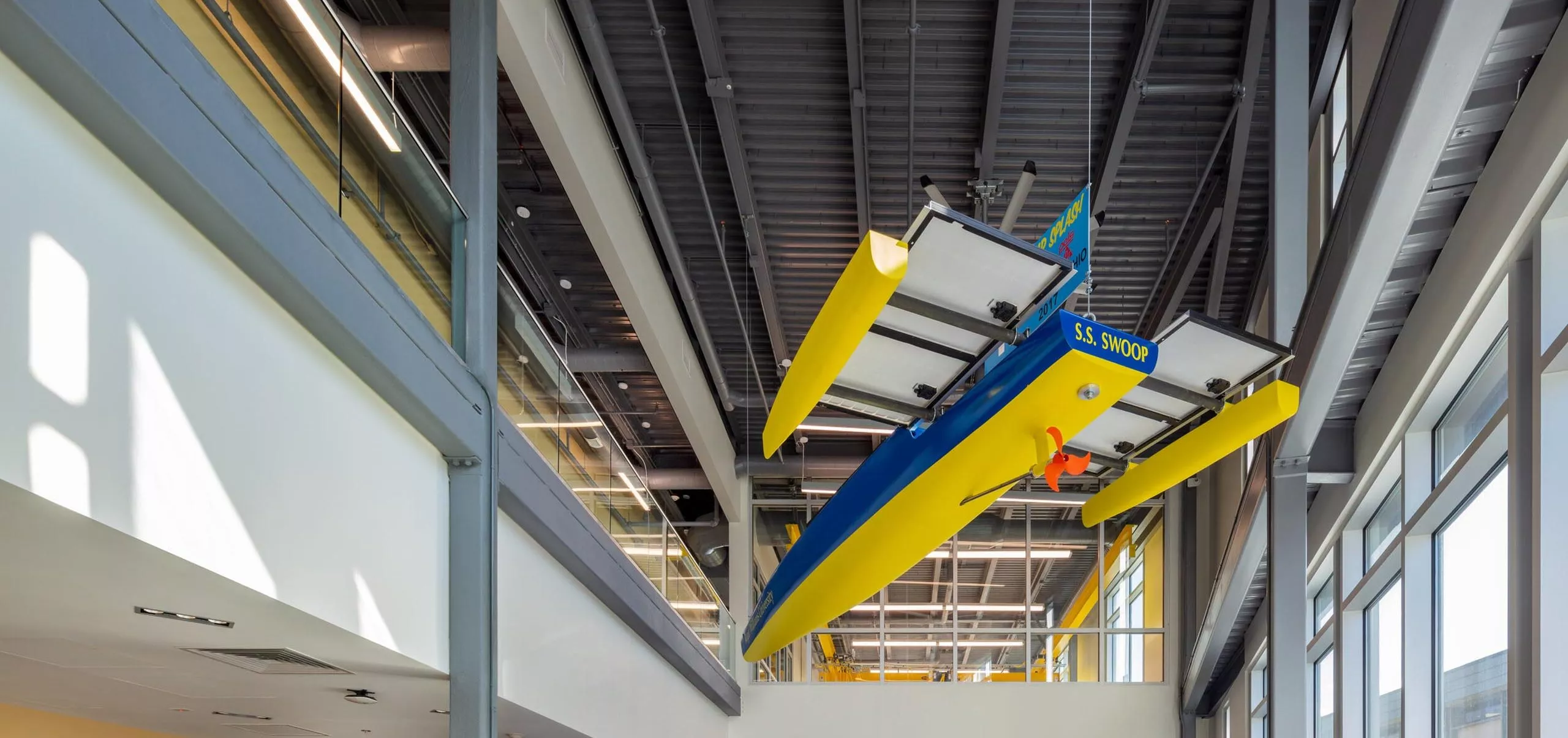 Tables and sitting areas at Roger Williams University SECCM Applied Learning Laboratories