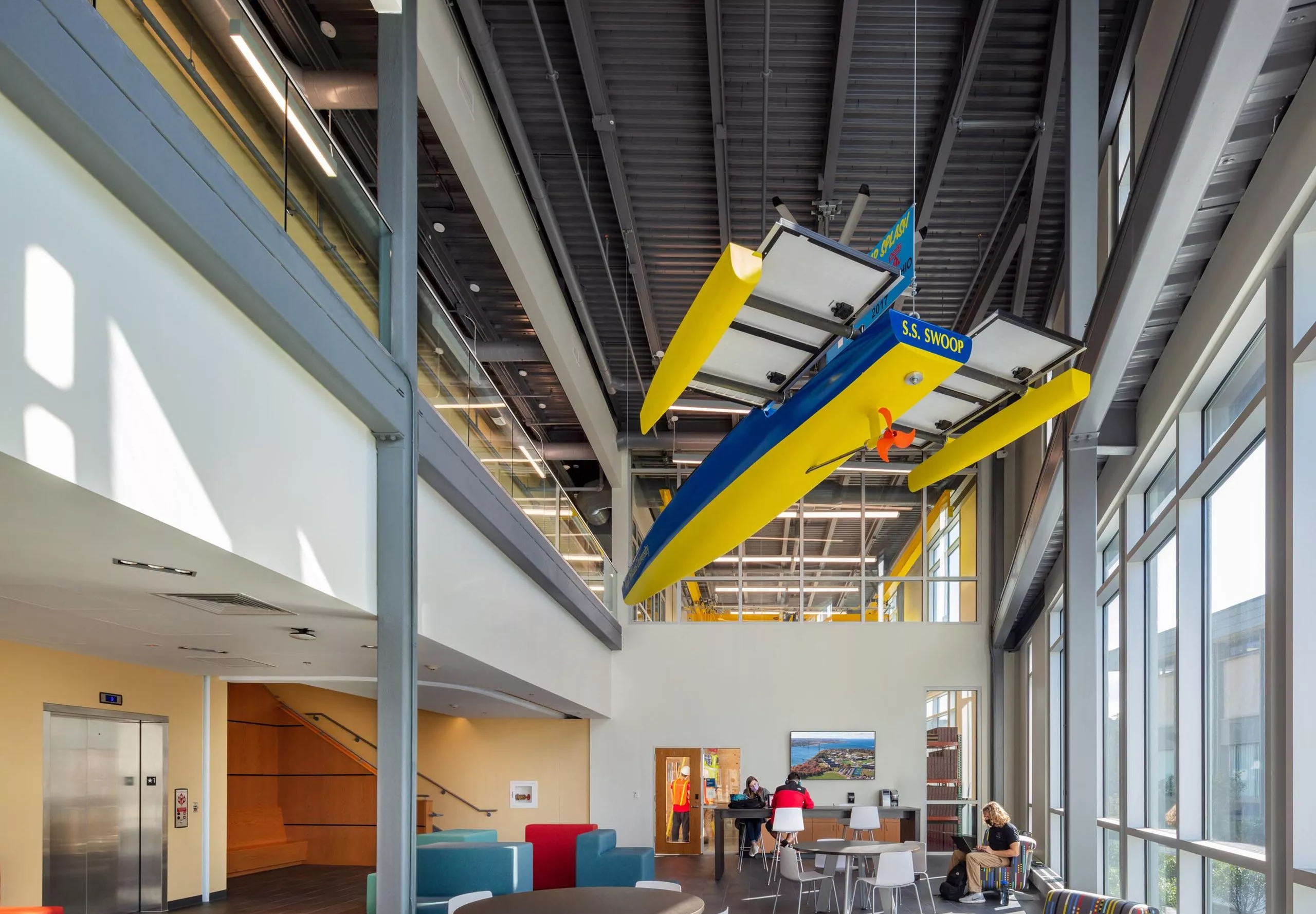 Tables and sitting areas at Roger Williams University SECCM Applied Learning Laboratories