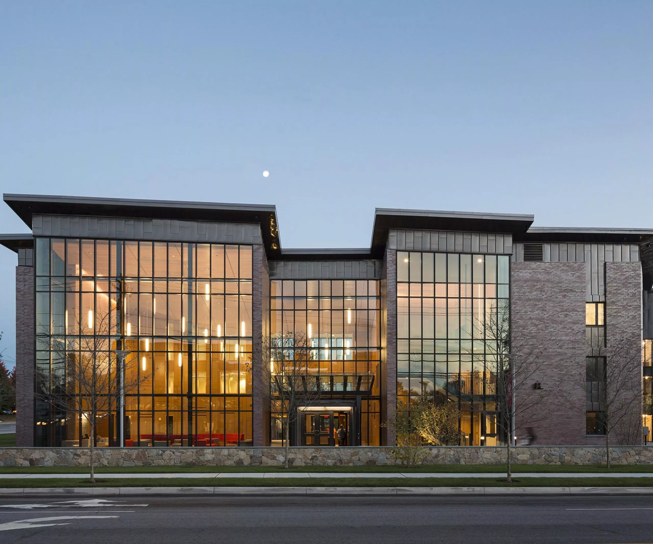 exterior view of Sacred Heart University Jorge Bergoglio Hall at dusk