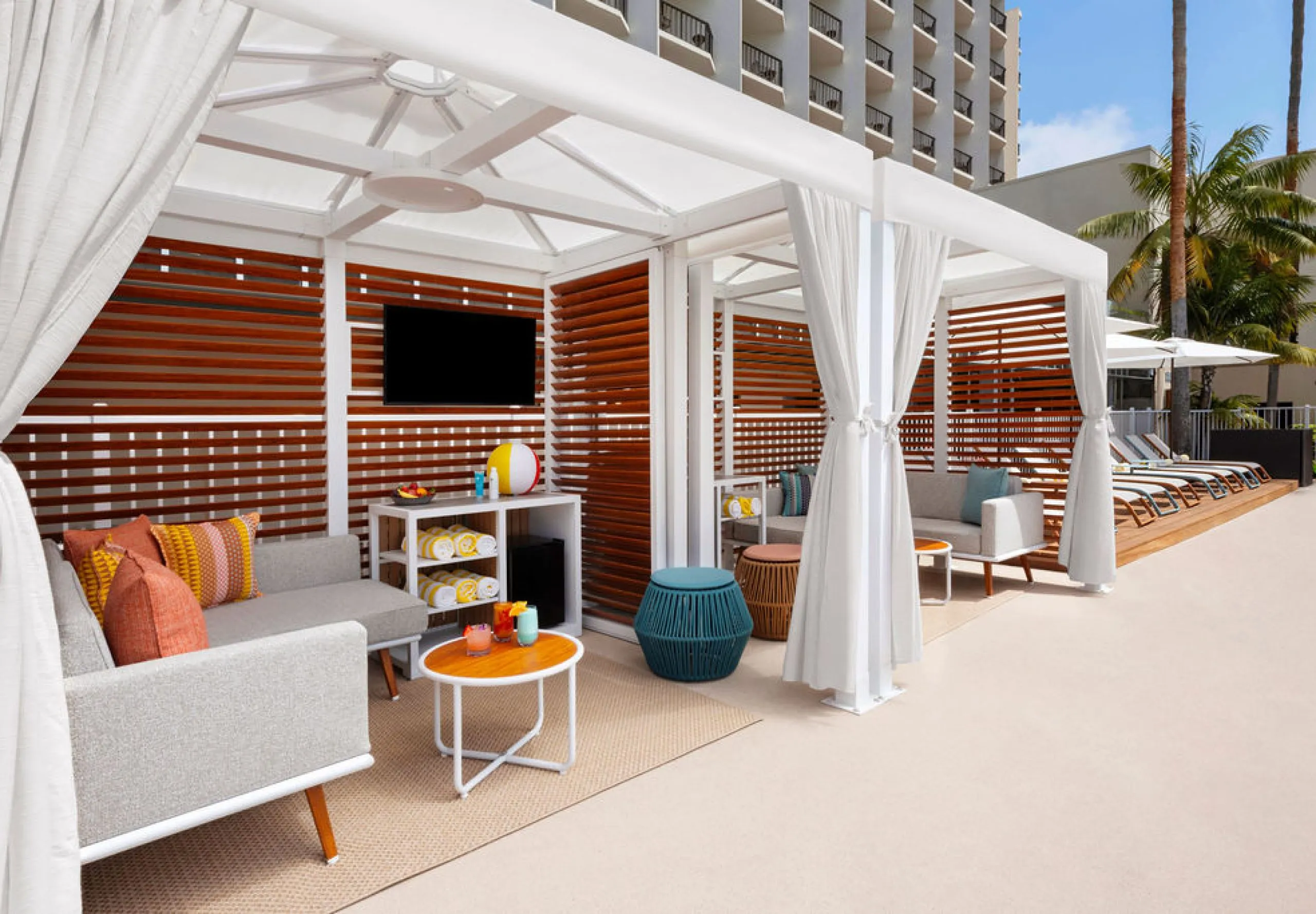 Exterior view of the poolside cabanas at the Sheraton San Diego Hotel