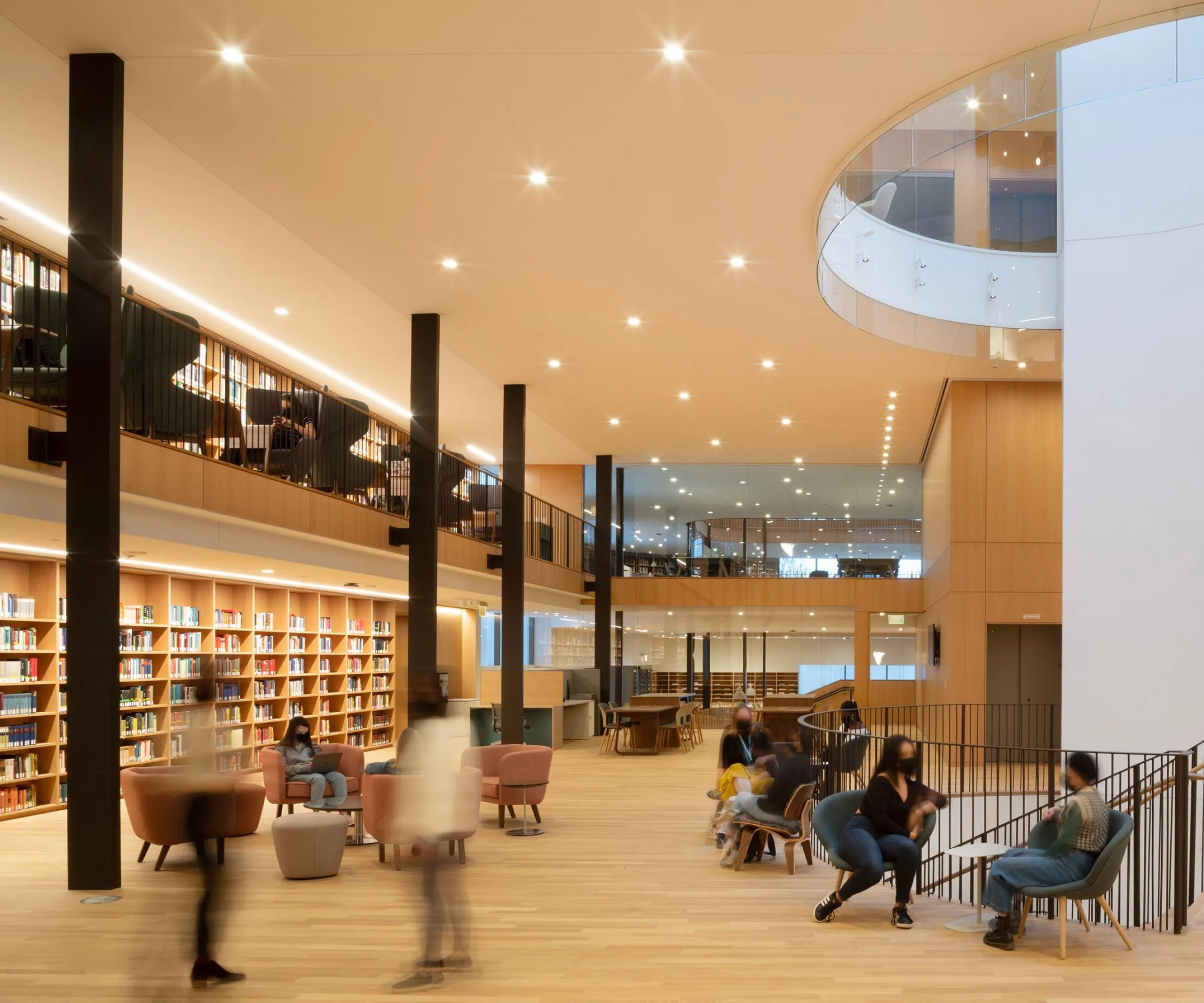 Sitting area and bookshelves inside Smith College Neilson Library