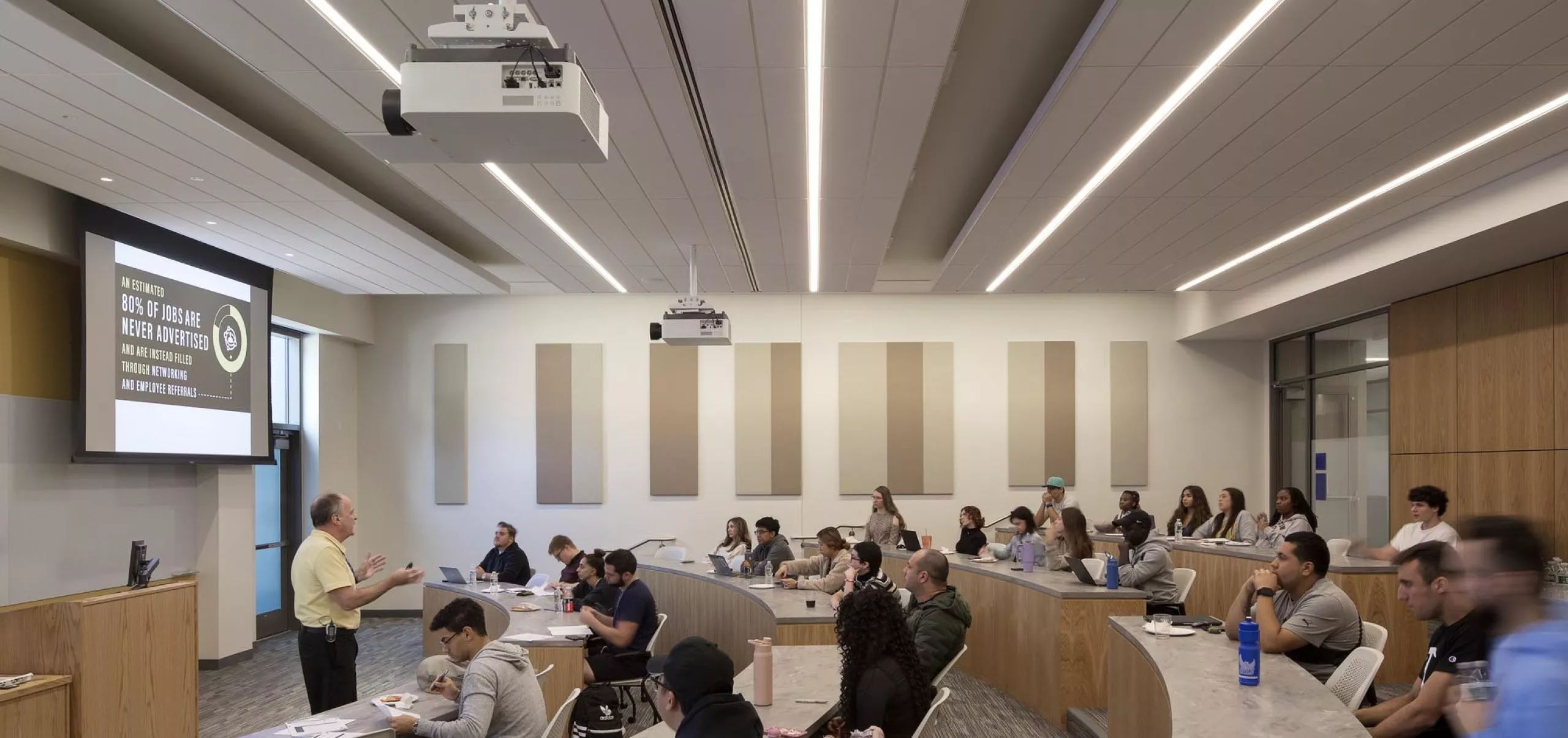 Students inside small classroom auditorium at Southern Connecticut State University School of Business