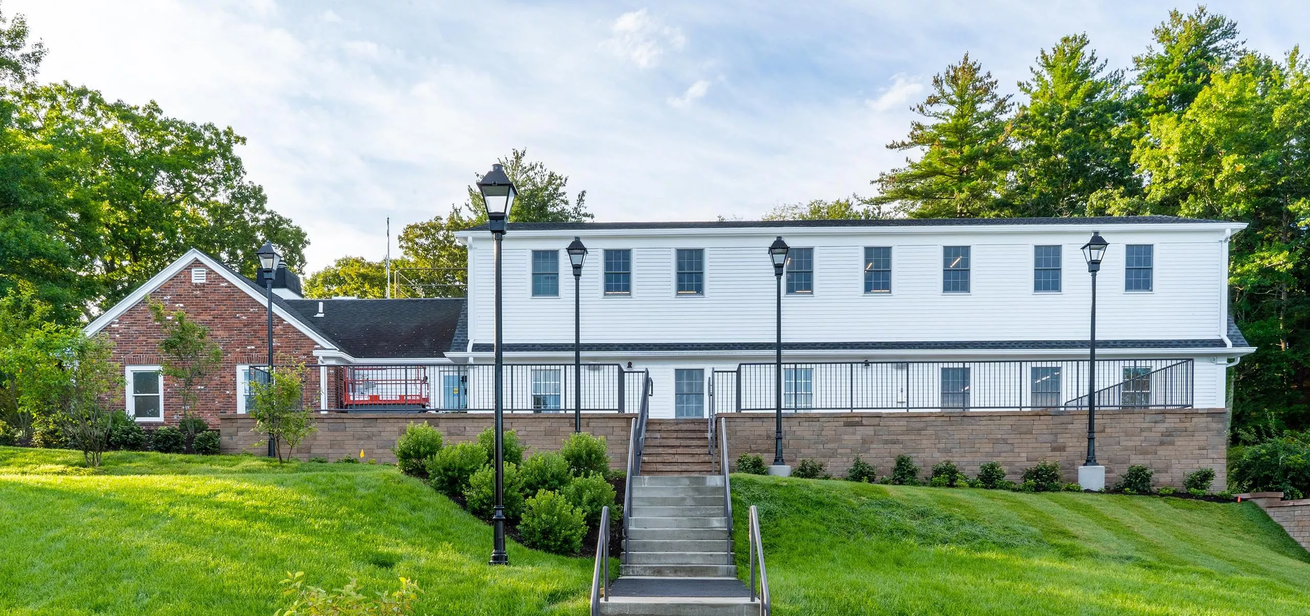 Outdoor landscape and staircase to Governor's Academy French Student Center