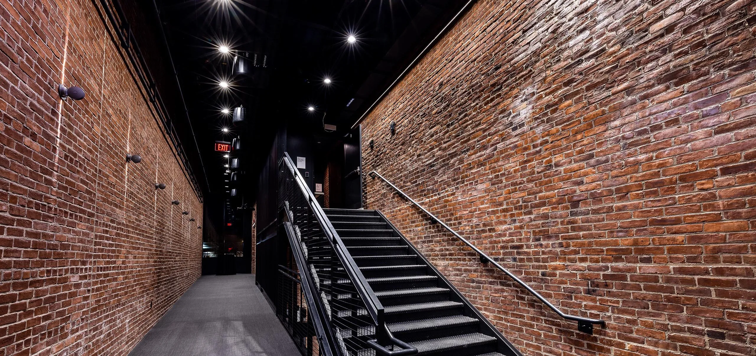 Arcade gallery and stairwell at the Huntington Theatre