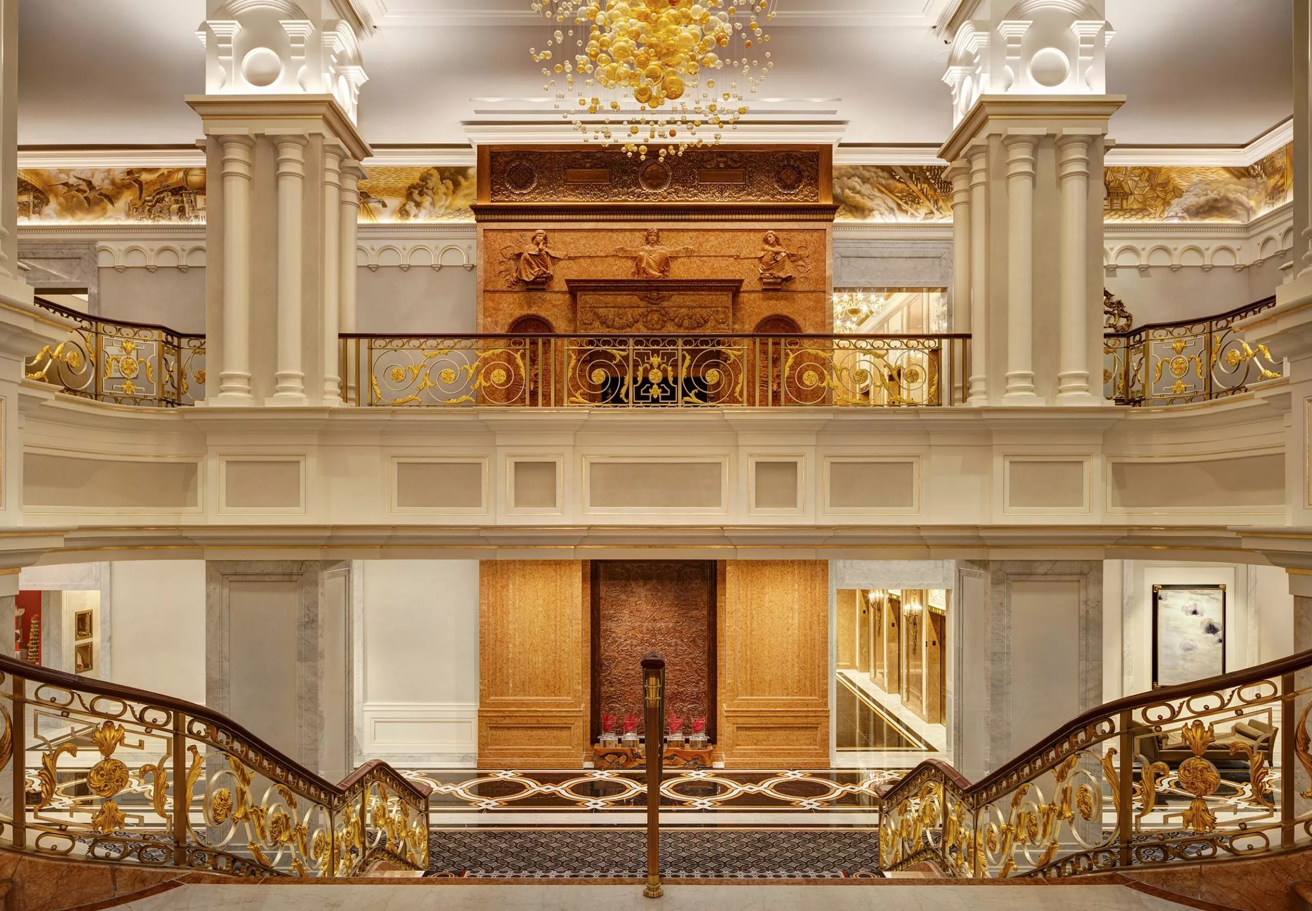 hotel lobby with staircases and banisters