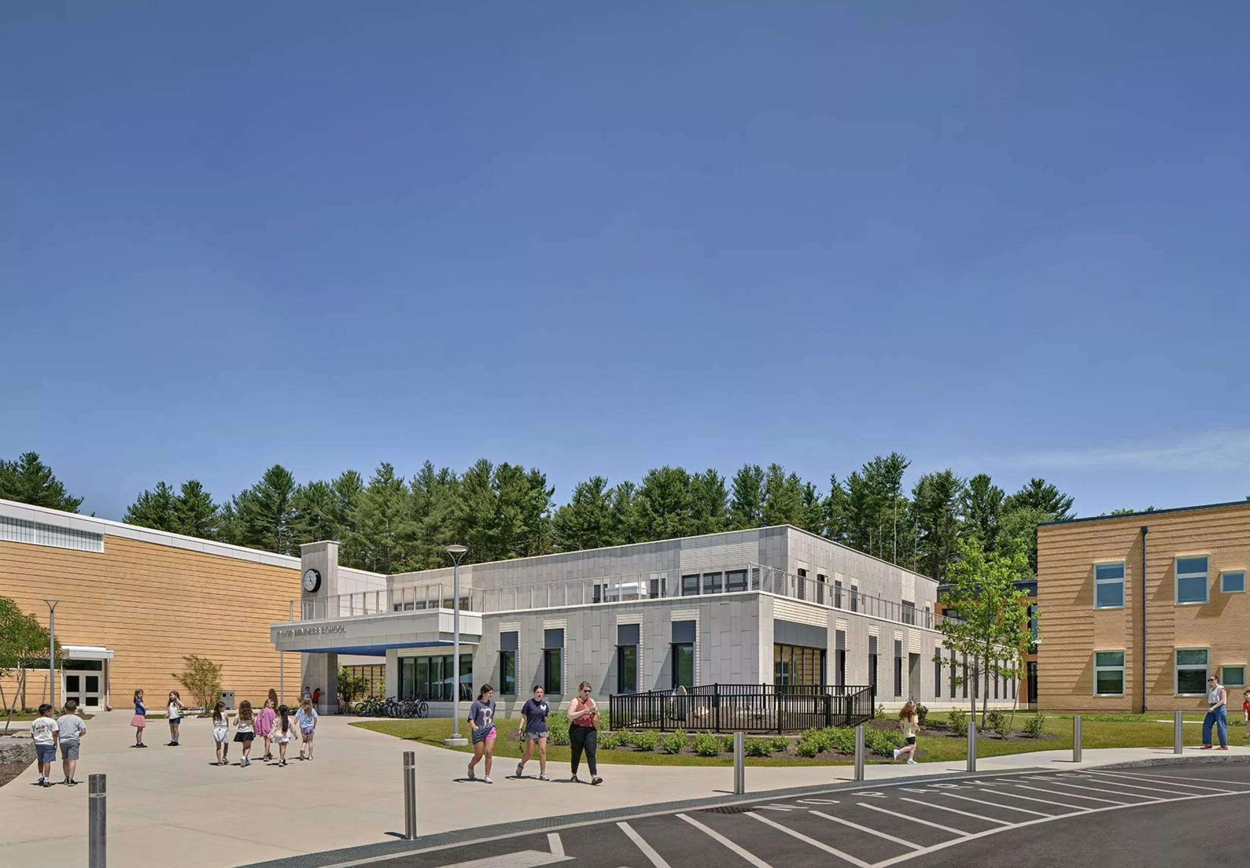 Children walking on sidewalk at David Mindess Elementarry School