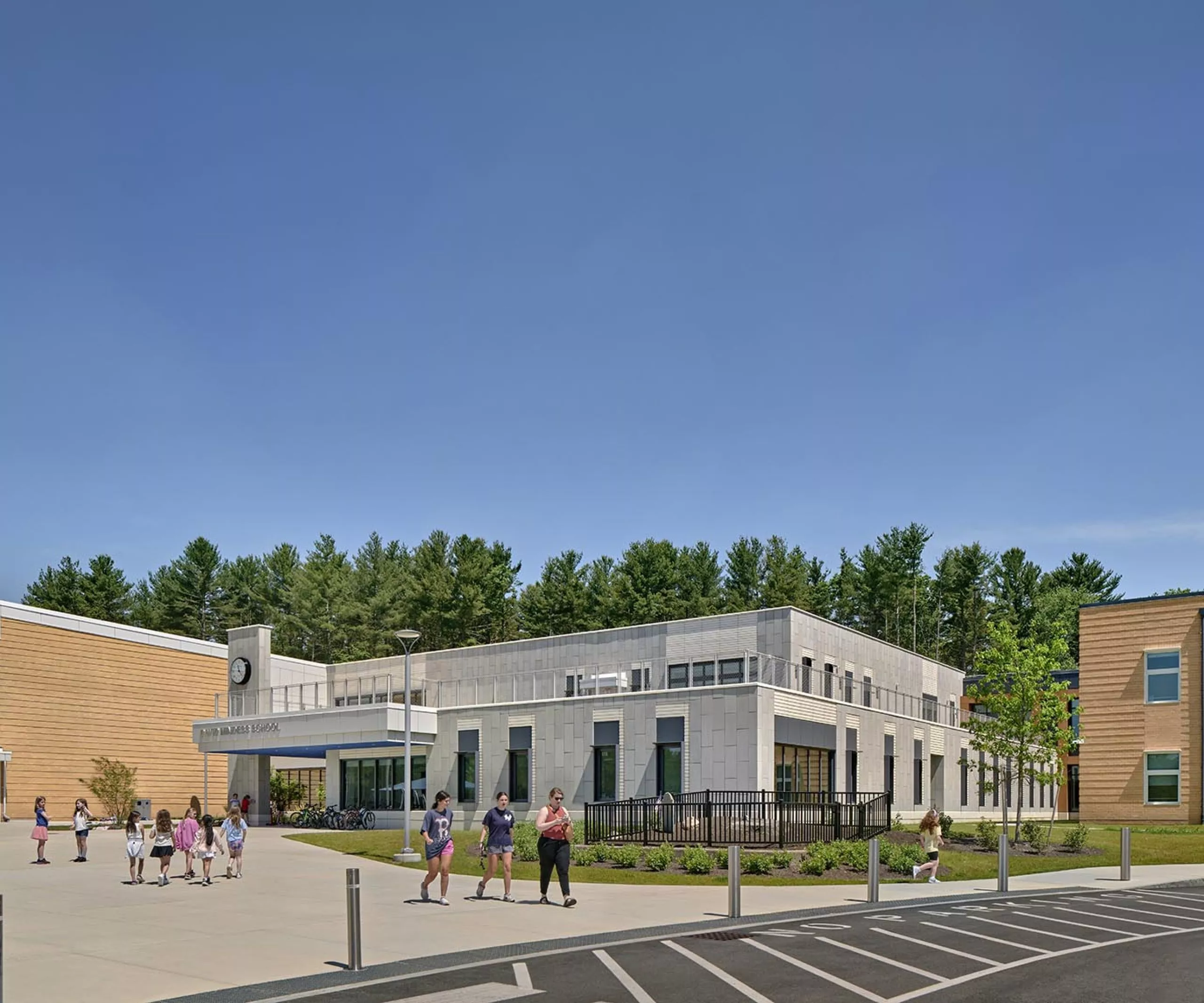 Children walking on sidewalk at David Mindess Elementarry School