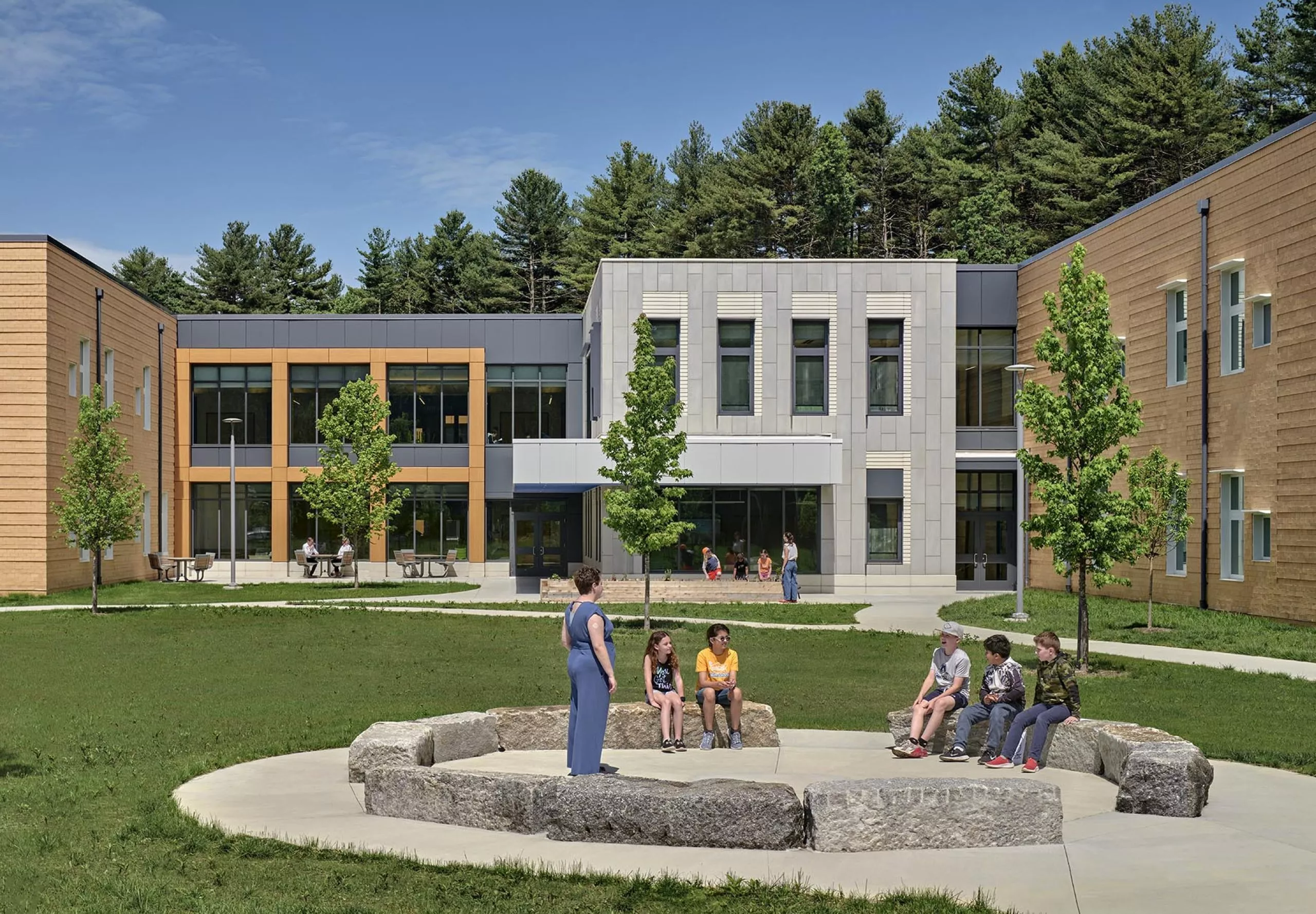 Outdoor seating and landscape outside of David Mindess Elementarry School