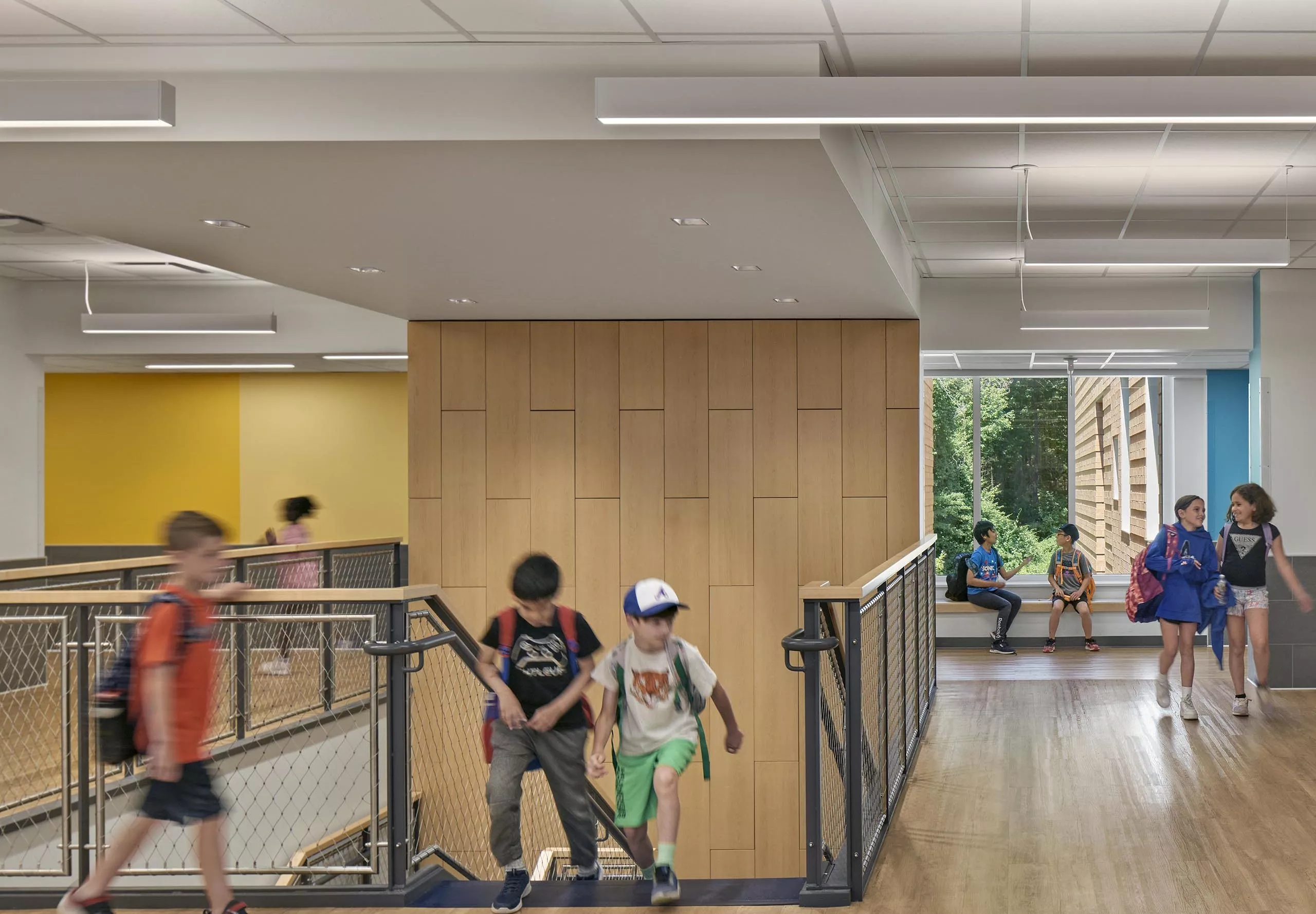 Kids walking around hallway in David Mindess Elementarry School