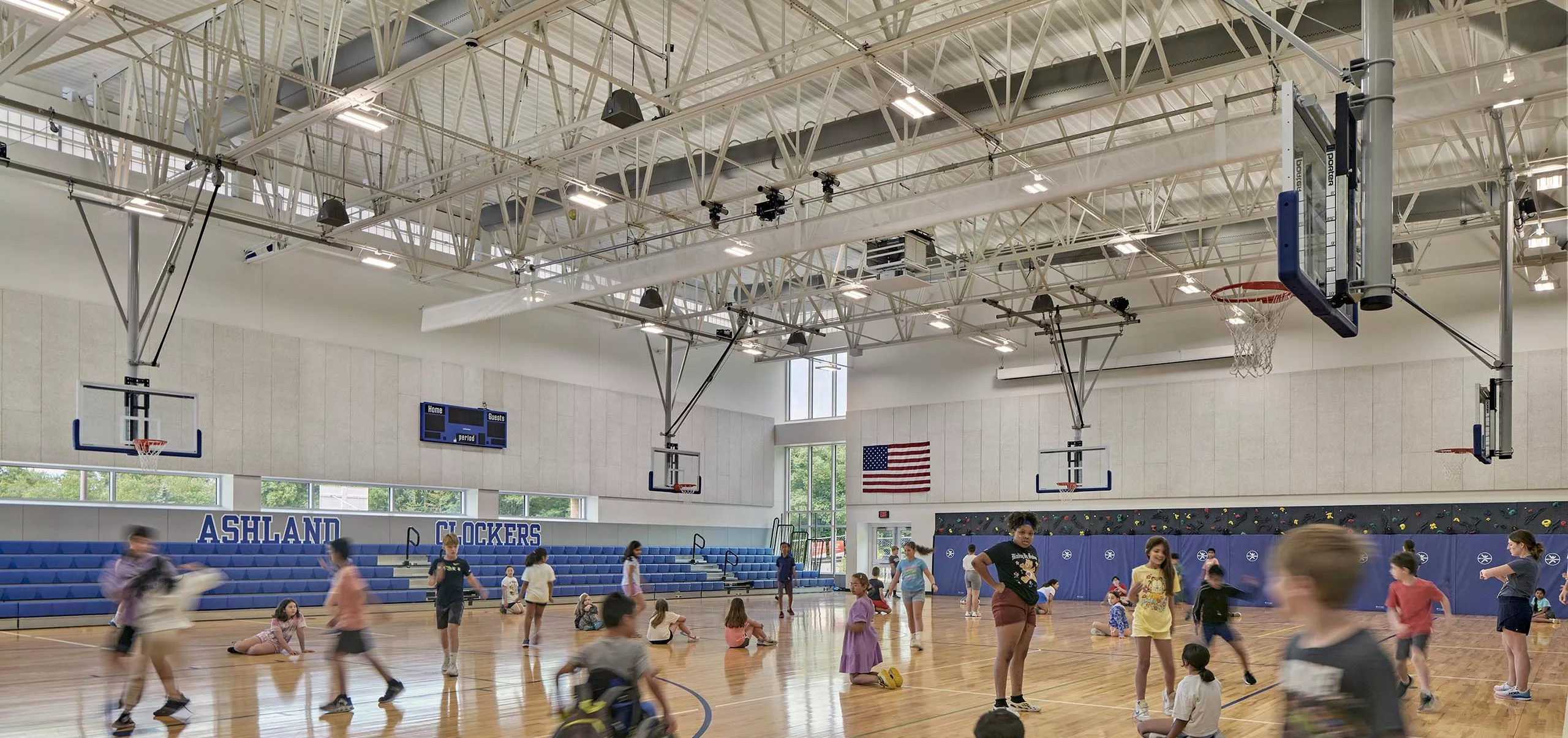 Children playing in large gym at David Mindess Elementarry School