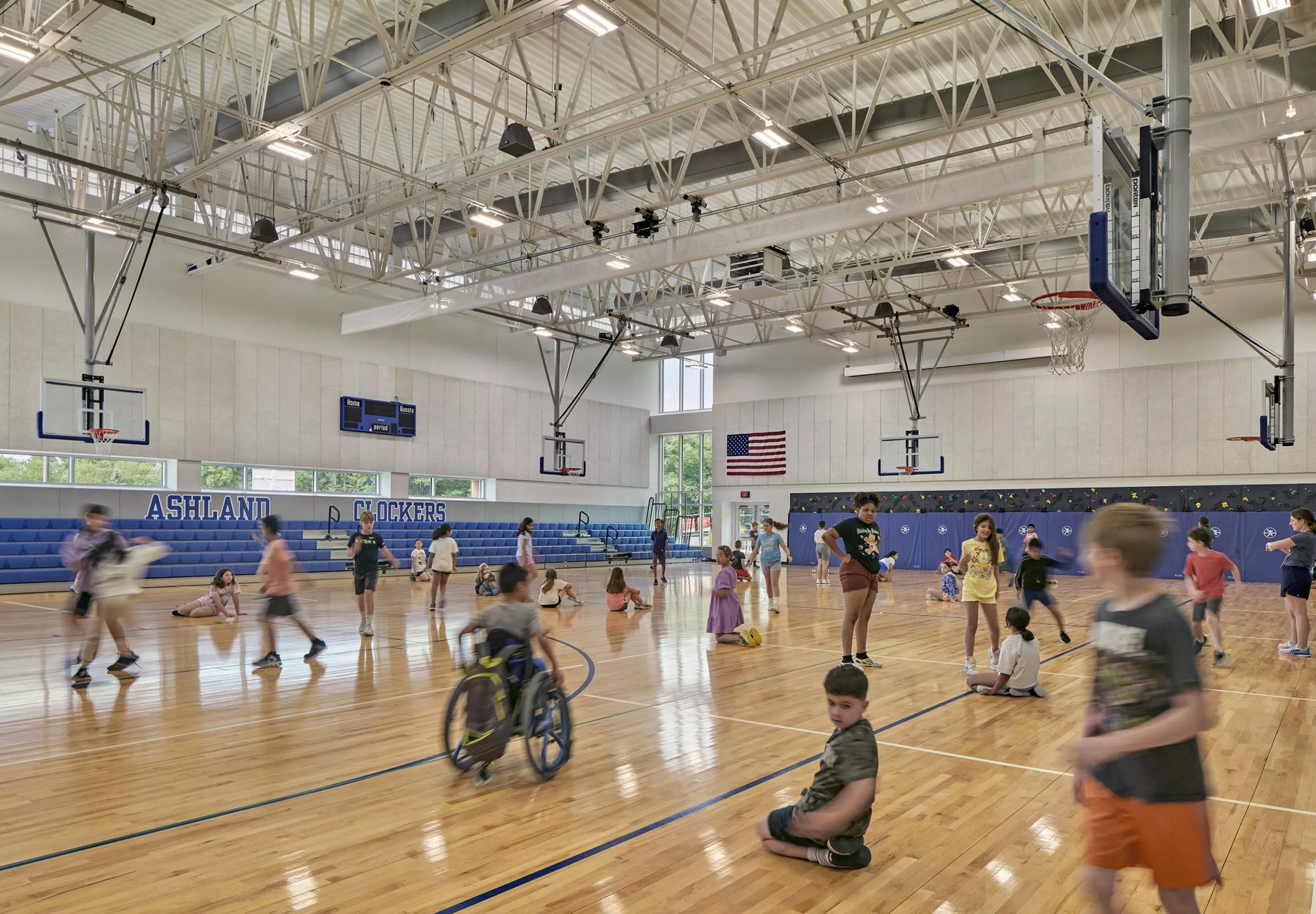 Children playing in large gym at David Mindess Elementarry School