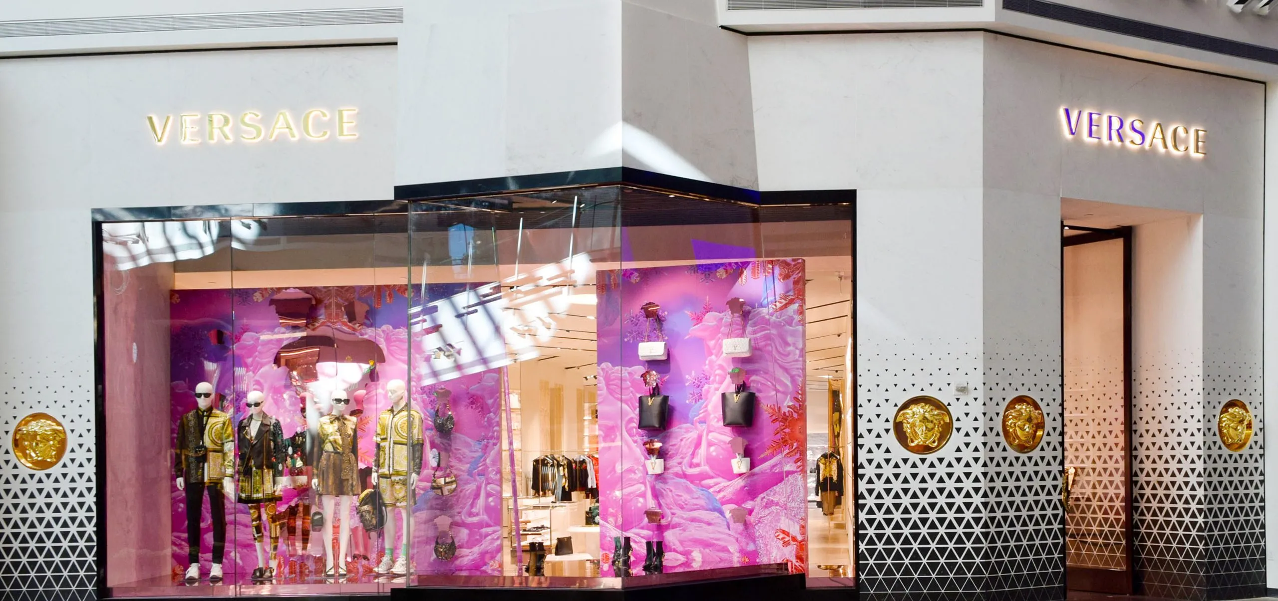 Versace display case showing into mall