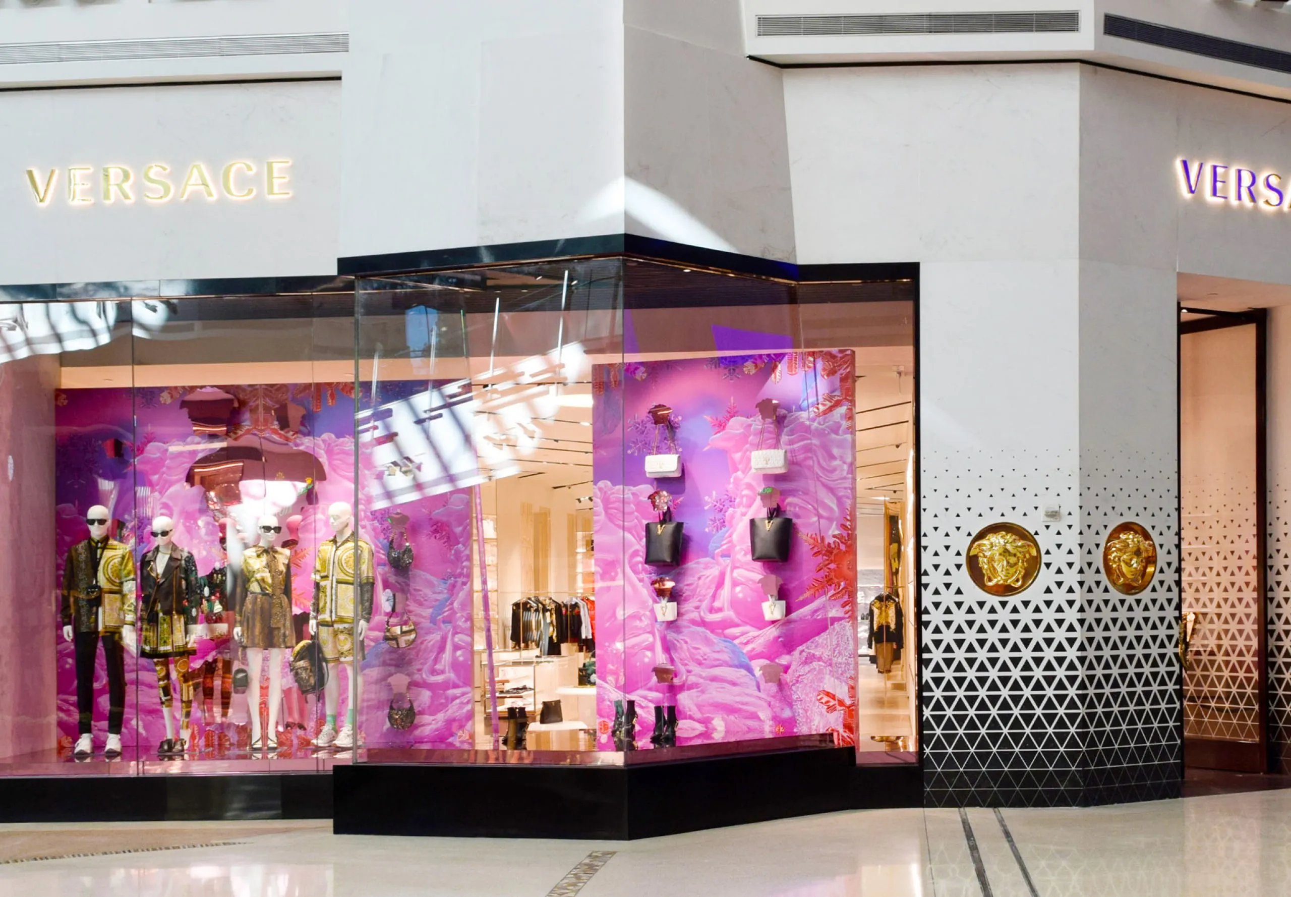 Versace display case showing into mall